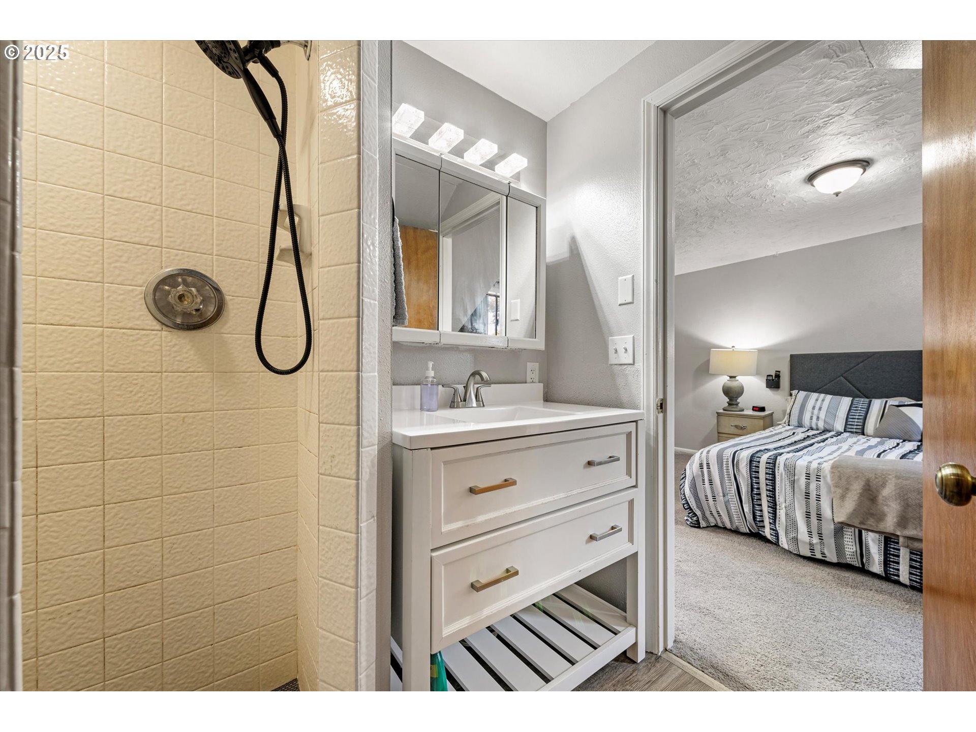 1805 East Street Baker City, OR 97814 - Photo 32 of 45 a spacious bathroom with a double vanity sink a mirror and shower