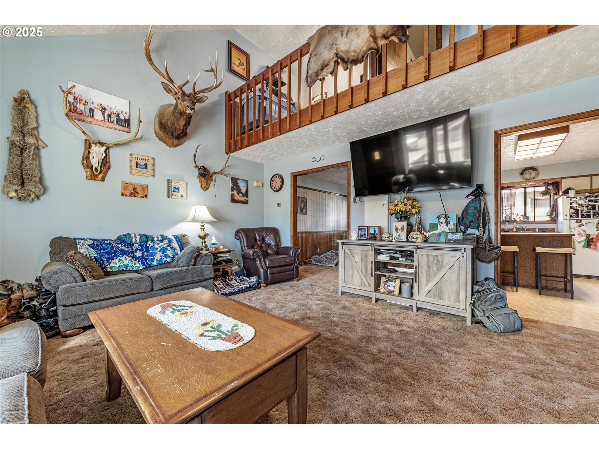 1805 East Street Baker City, OR 97814 - Photo 33 of 45 a living room with furniture and a flat screen tv