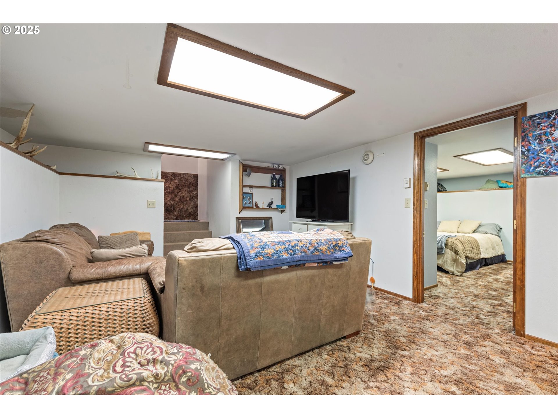 1805 East Street Baker City, OR 97814 - Photo 43 of 45 a living room with furniture and a flat screen tv