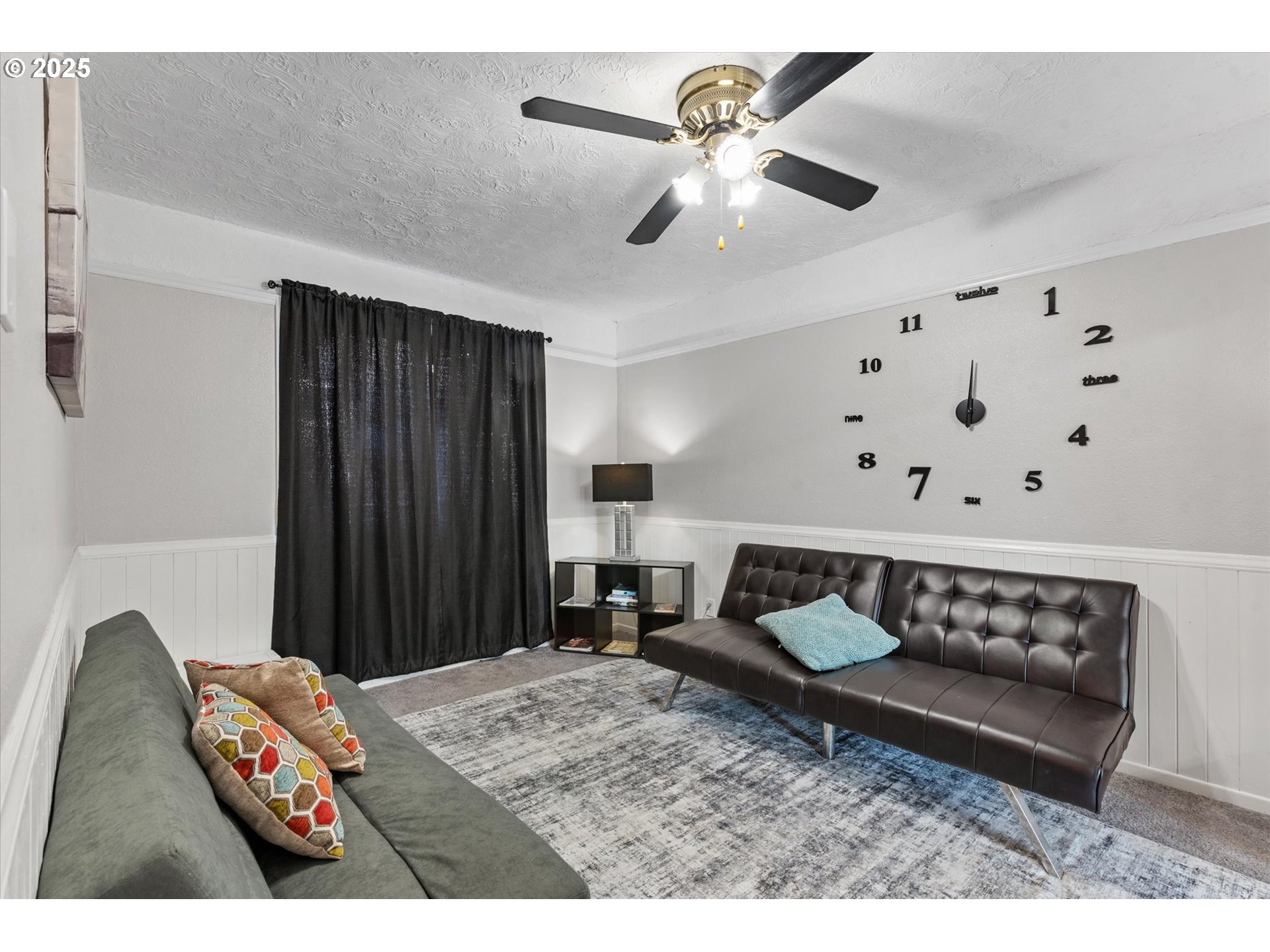 1805 East Street Baker City, OR 97814 - Photo 8 of 45 a bedroom with a bed and a chandelier