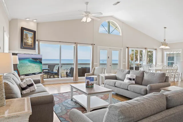 a view of balcony with furniture and city view