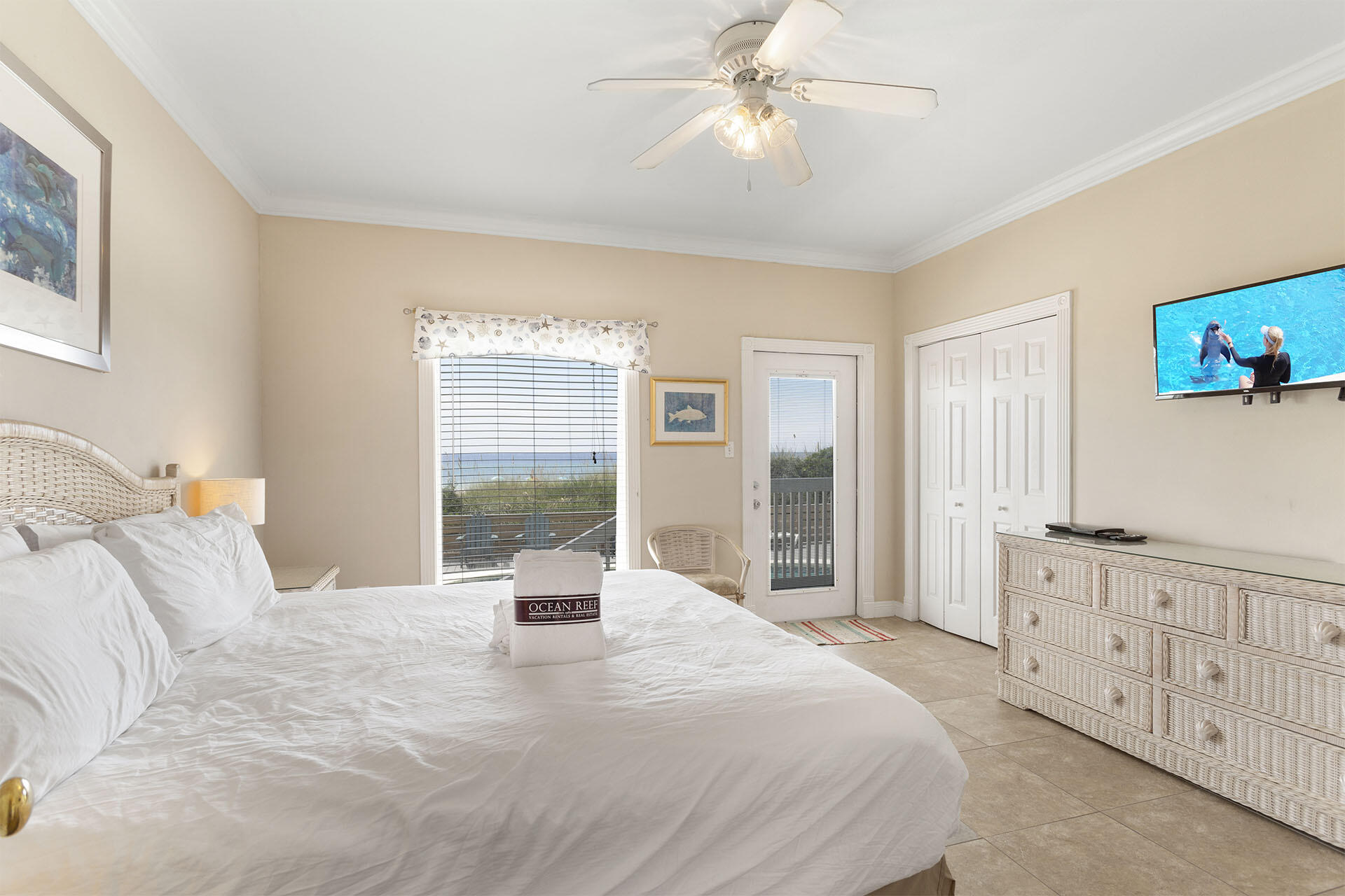 20 Sandy Beach Road Miramar Beach, FL 32550 - Photo 24 of 42 a bedroom with a large bed and a tv