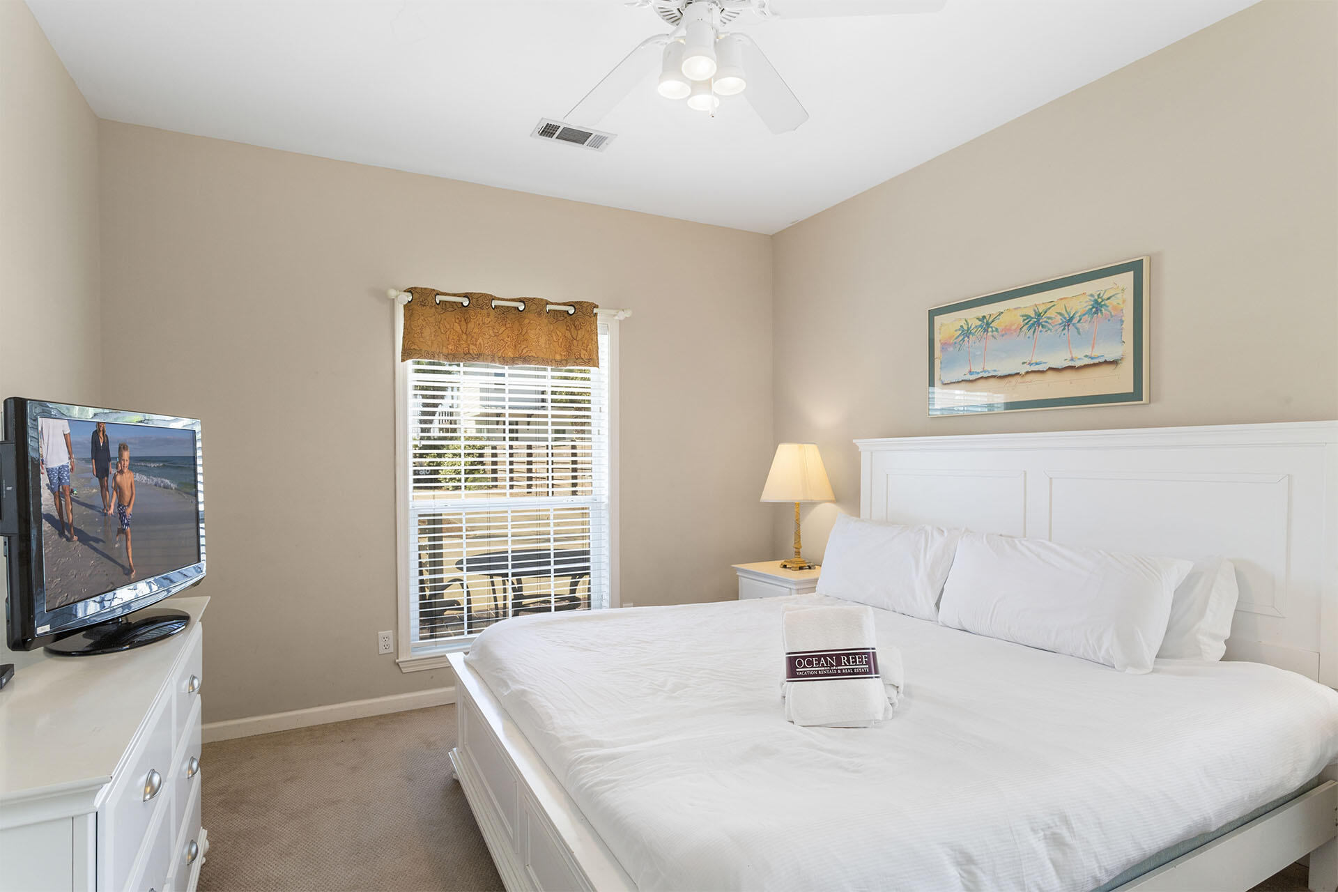 20 Sandy Beach Road Miramar Beach, FL 32550 - Photo 33 of 42 a bedroom with a large bed and a flat screen tv