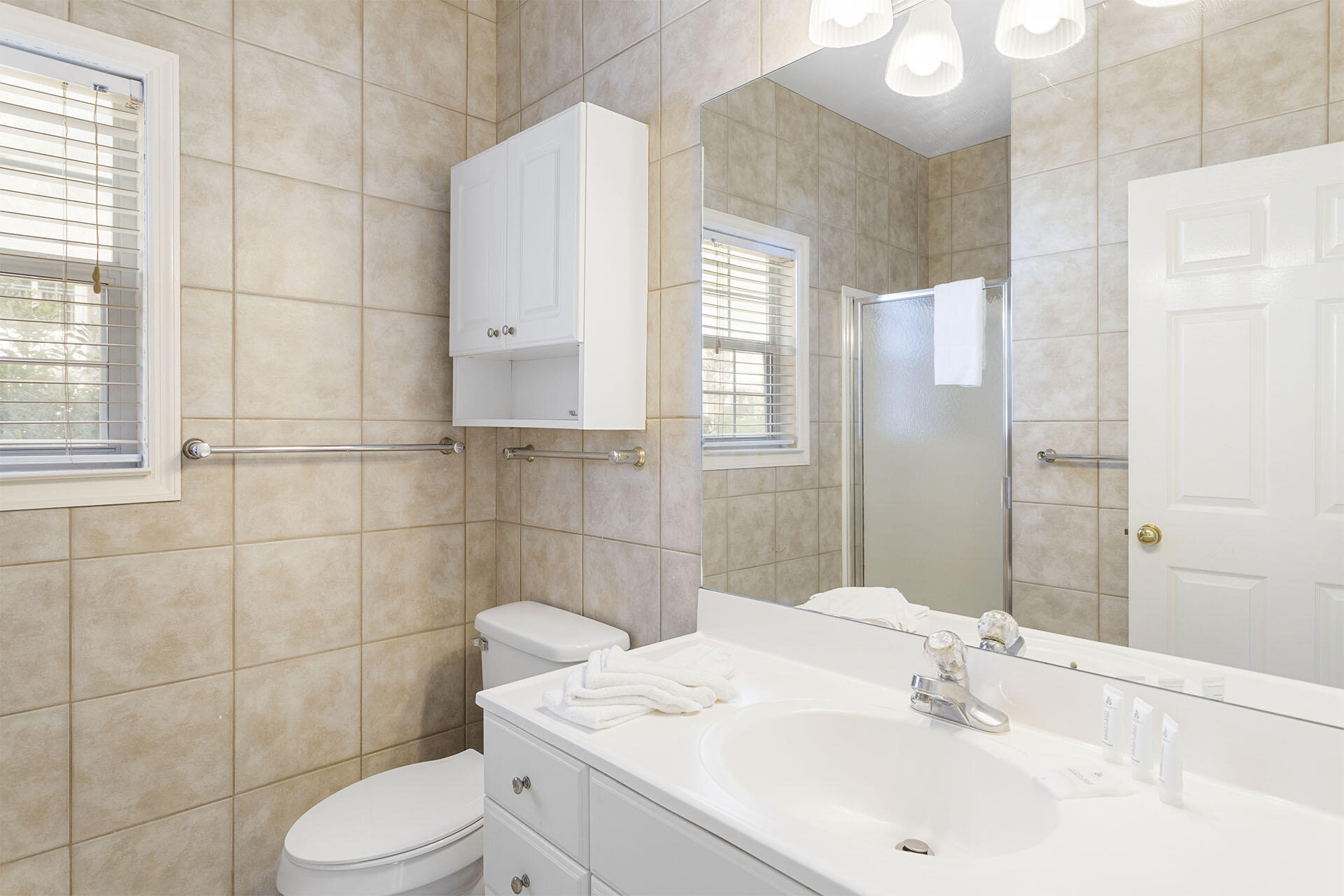 20 Sandy Beach Road Miramar Beach, FL 32550 - Photo 34 of 42 a bathroom with a sink toilet and shower