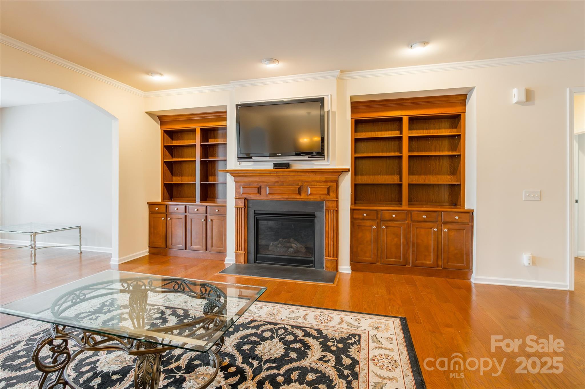 2050 Yellowstone Drive Fort Mill, SC 29707 - Photo 11 of 42 a living room with a fireplace and a flat screen tv