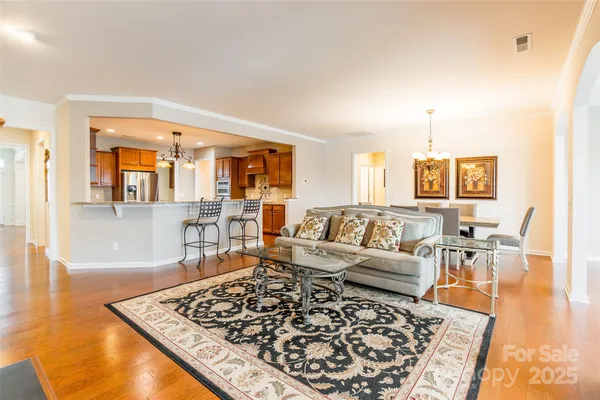 a living room with furniture and a rug