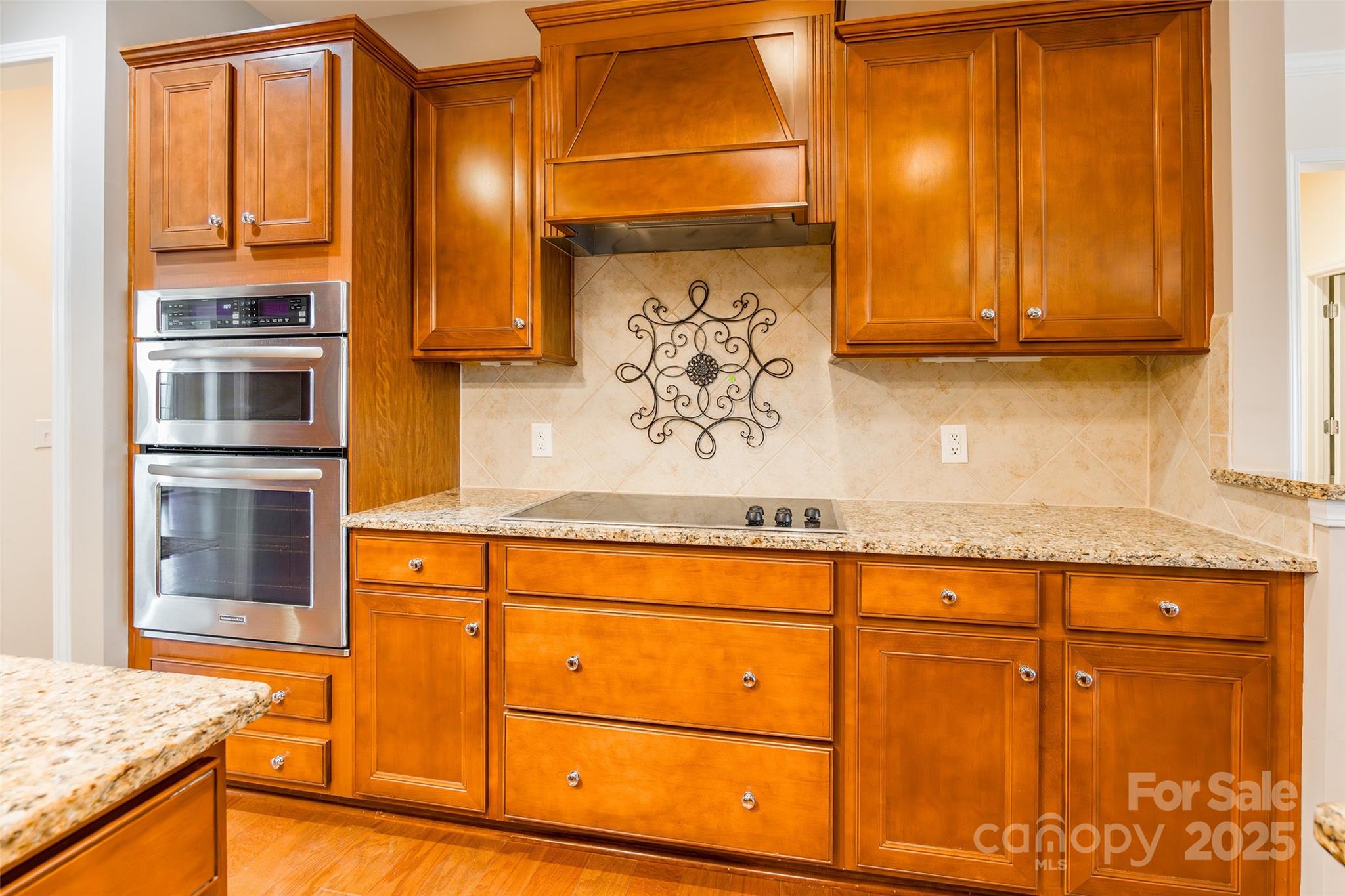 2050 Yellowstone Drive Fort Mill, SC 29707 - Photo 17 of 42 a kitchen with stainless steel appliances granite countertop a sink and cabinets