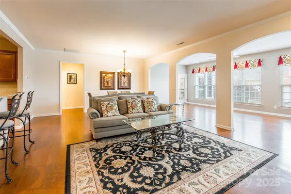 a living room with furniture and a rug