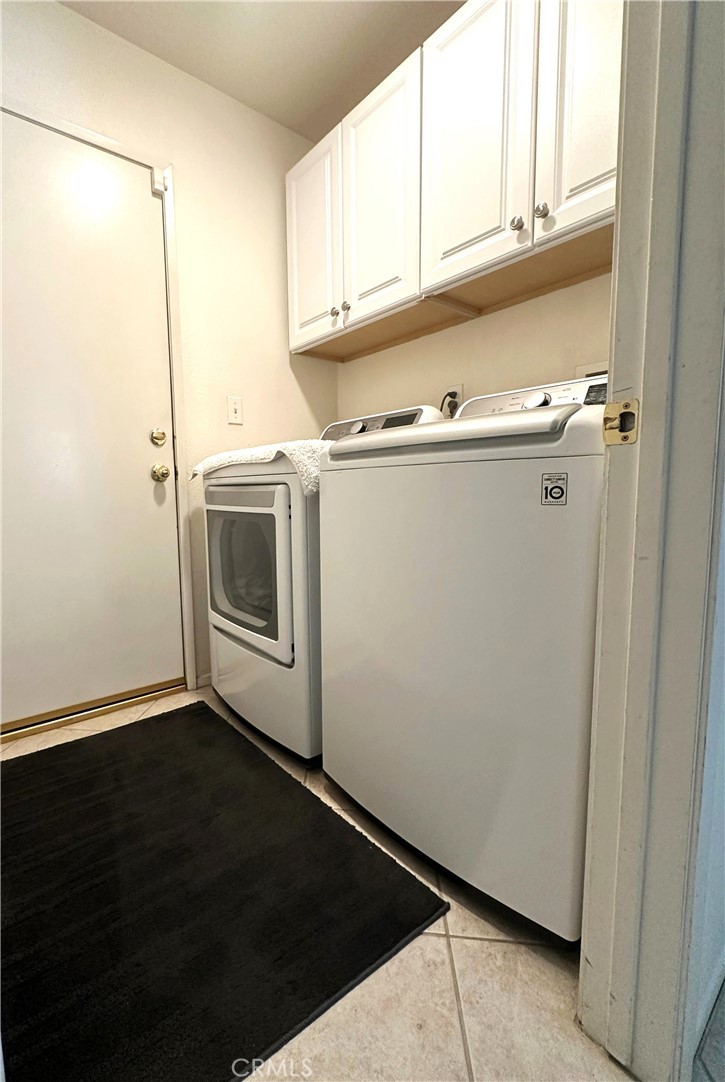 1665 Ravenswood Road Beaumont, CA 92223 - Photo 17 of 41 a close view of a utility room with washer and dryer