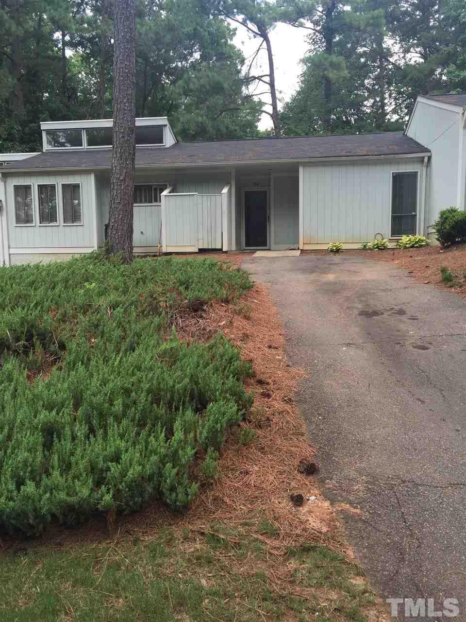 706 Godwin Court Raleigh, NC 27606 - Photo 2 of 19 a view of a house with a yard