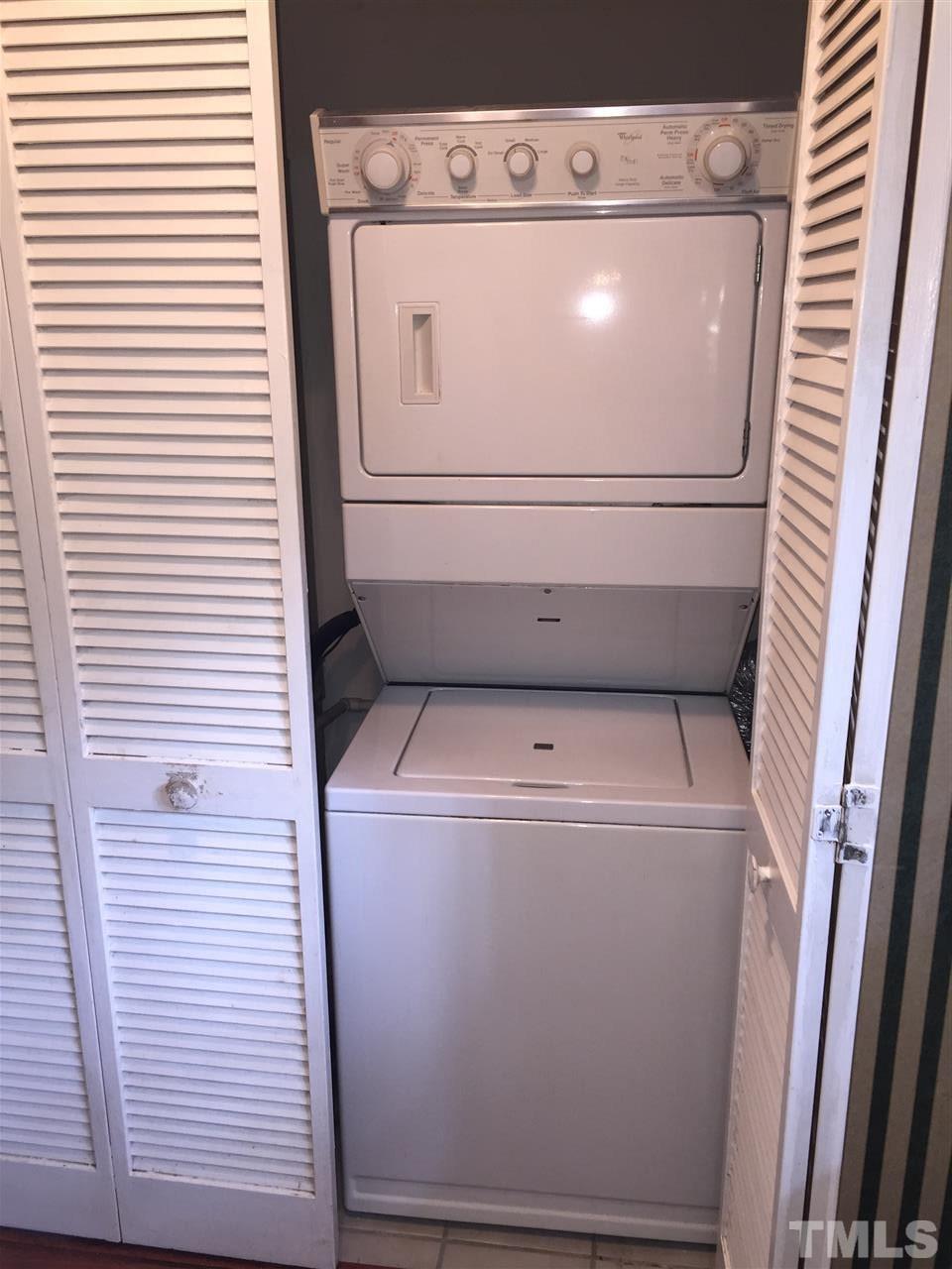 706 Godwin Court Raleigh, NC 27606 - Photo 17 of 19 a utility room with dryer and washer