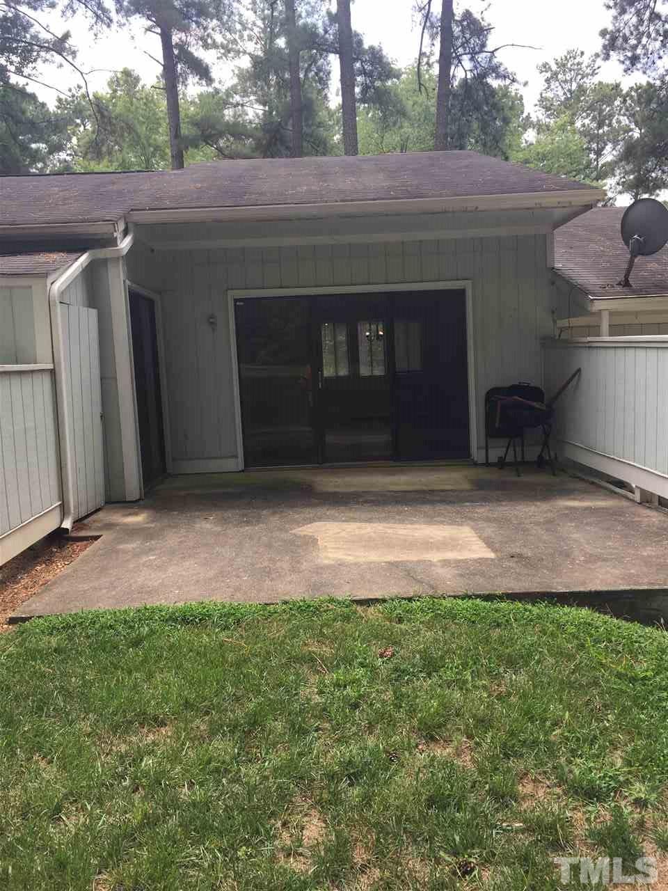 706 Godwin Court Raleigh, NC 27606 - Photo 19 of 19 a front view of a house with a yard