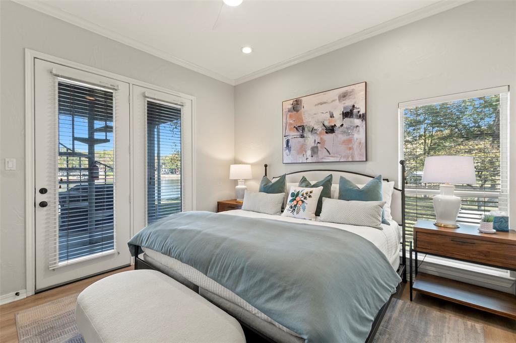 258 Sunset Point Mabank, TX 75156 - Photo 19 of 40 a bedroom with a large bed and a window