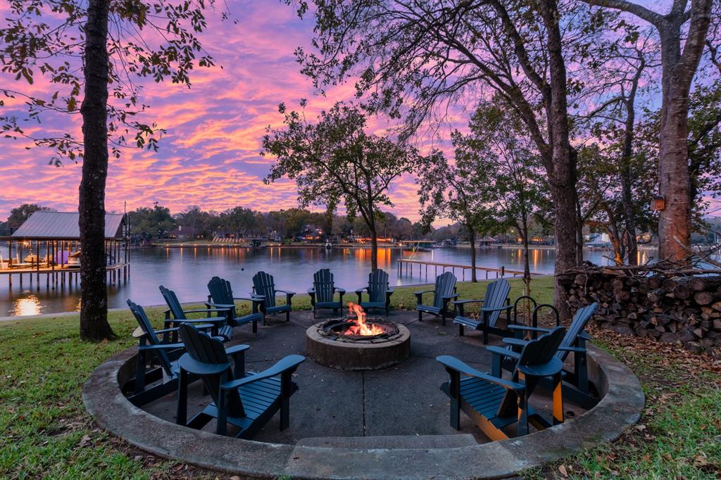 258 Sunset Point Mabank, TX 75156 - Photo 2 of 40 a view of a backyard with sitting area and outdoor kitchen