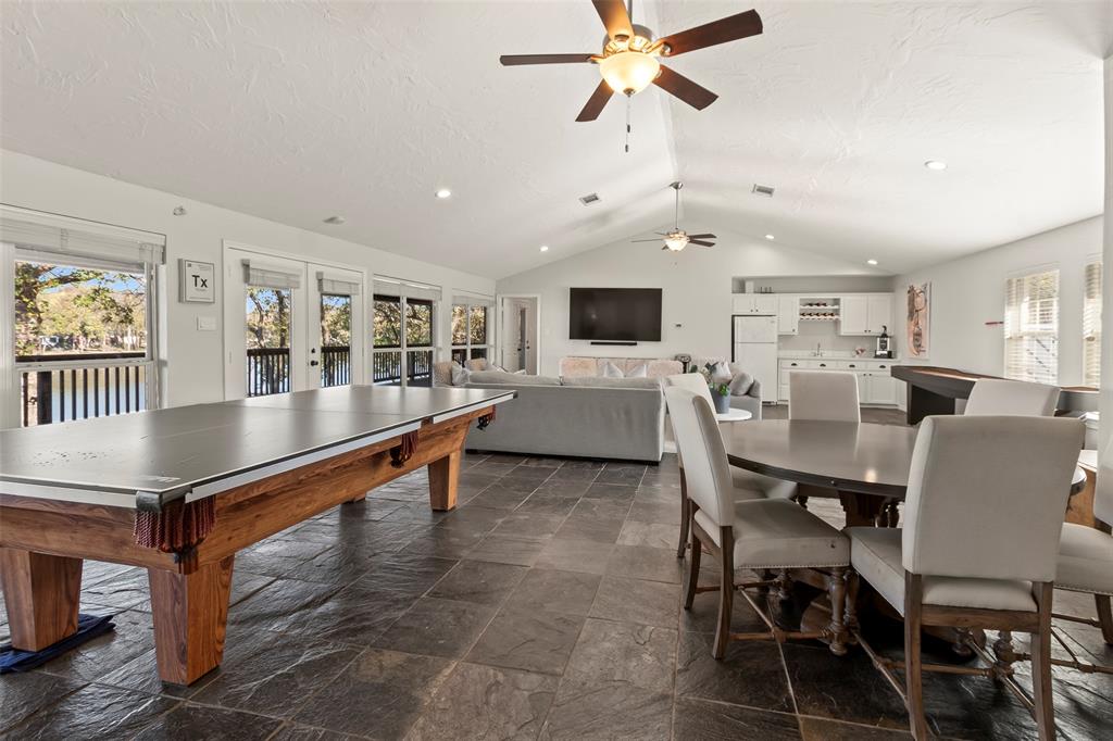 258 Sunset Point Mabank, TX 75156 - Photo 23 of 40 a living room with furniture a dining table and kitchen view