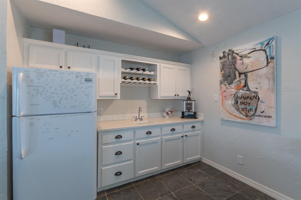 258 Sunset Point Mabank, TX 75156 - Photo 25 of 40 a kitchen with cabinets and window