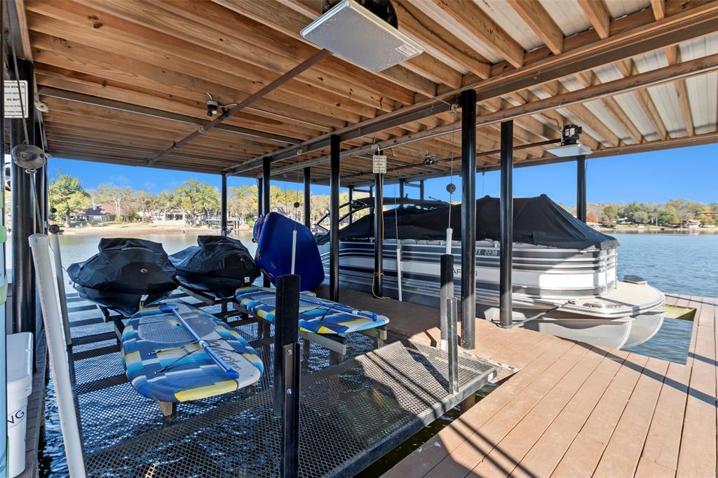 258 Sunset Point Mabank, TX 75156 - Photo 34 of 40 a view of a patio with table and chairs