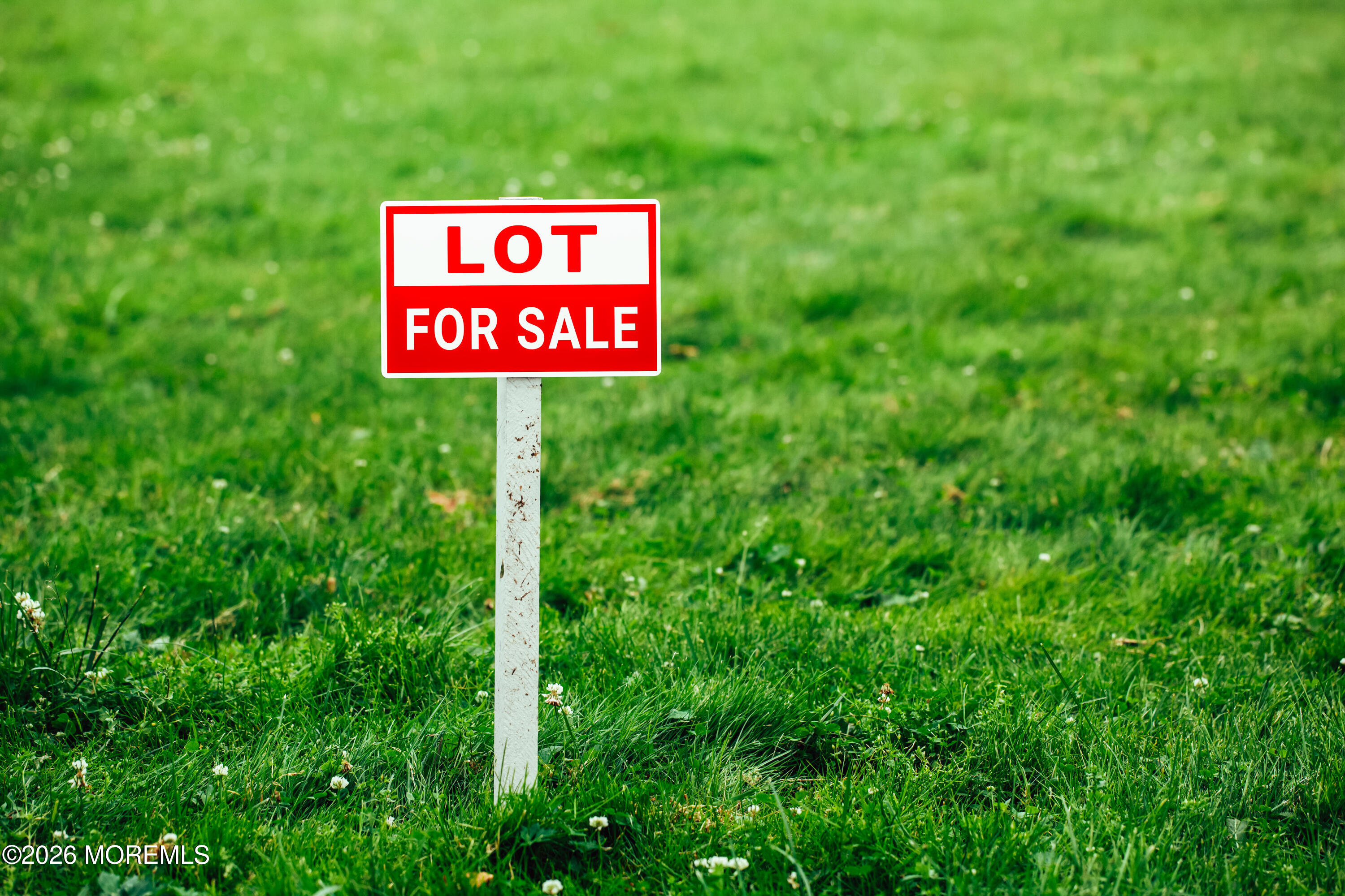 53 Bonita Road Waretown, NJ 08758 - Photo 2 of 7 a sign board with a forest