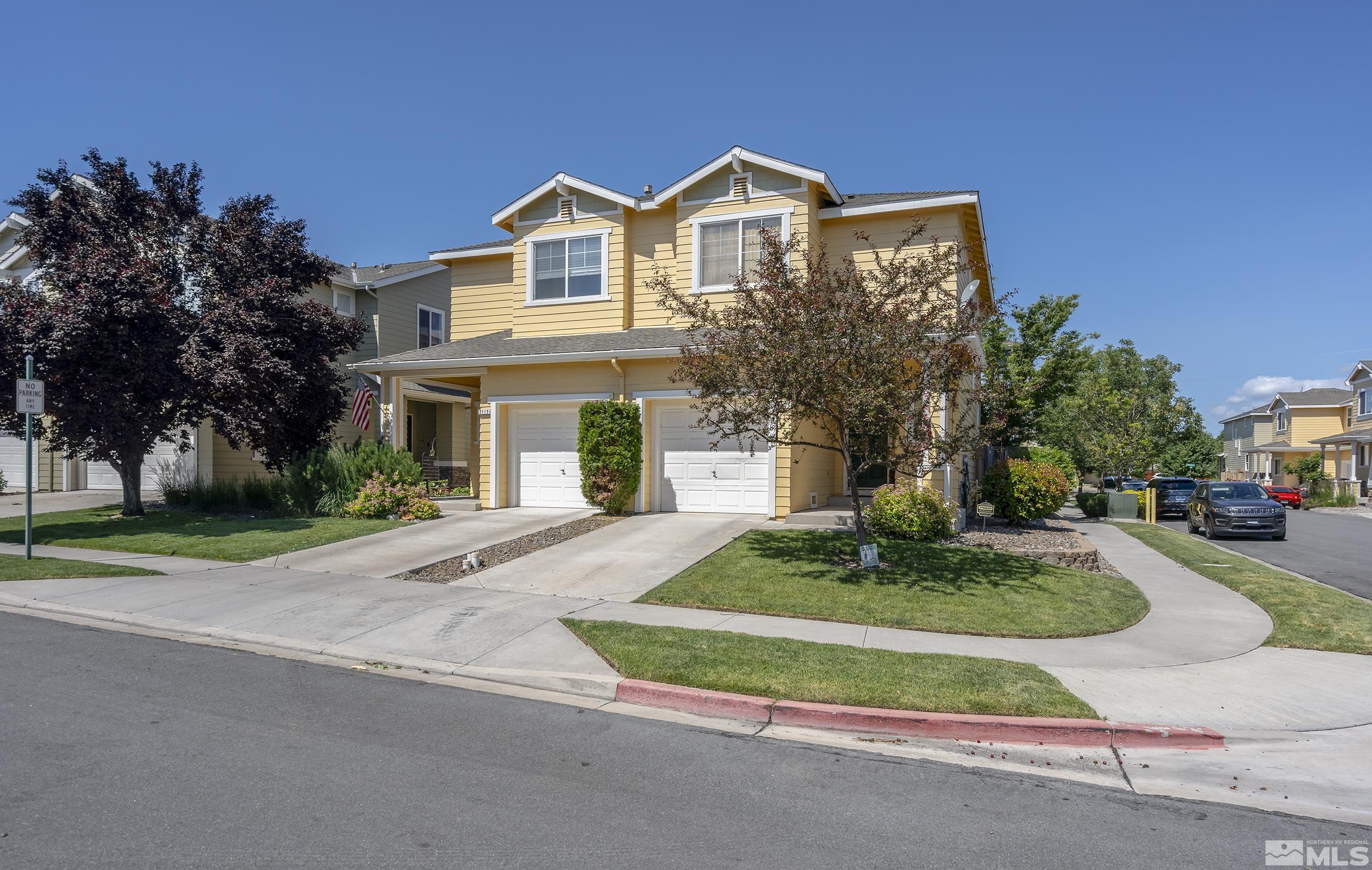2115 Stanton Lane Reno, NV 89502 - Photo 1 of 18 a front view of a house with a yard