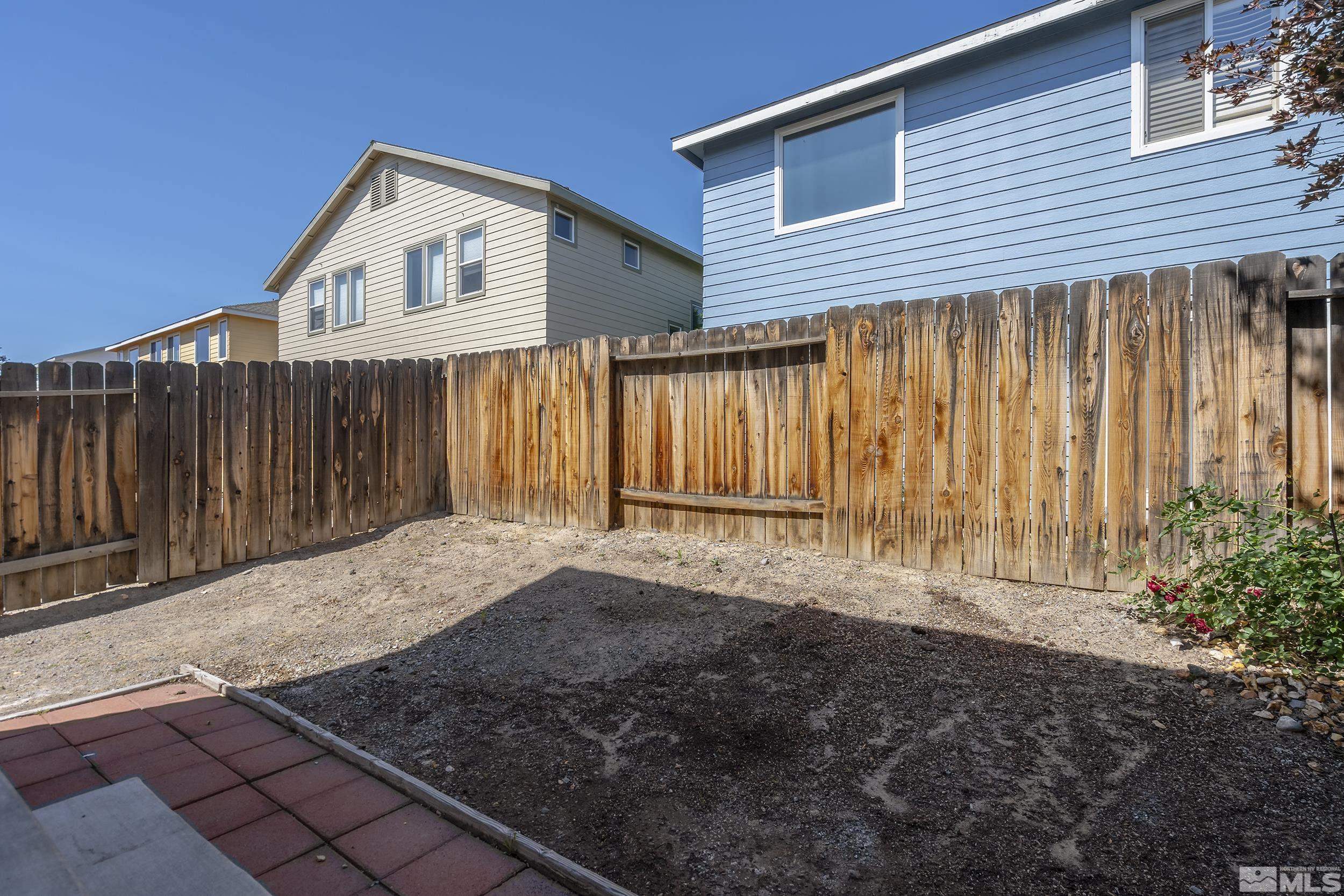 2115 Stanton Lane Reno, NV 89502 - Photo 17 of 18 a front view of a house with a yard