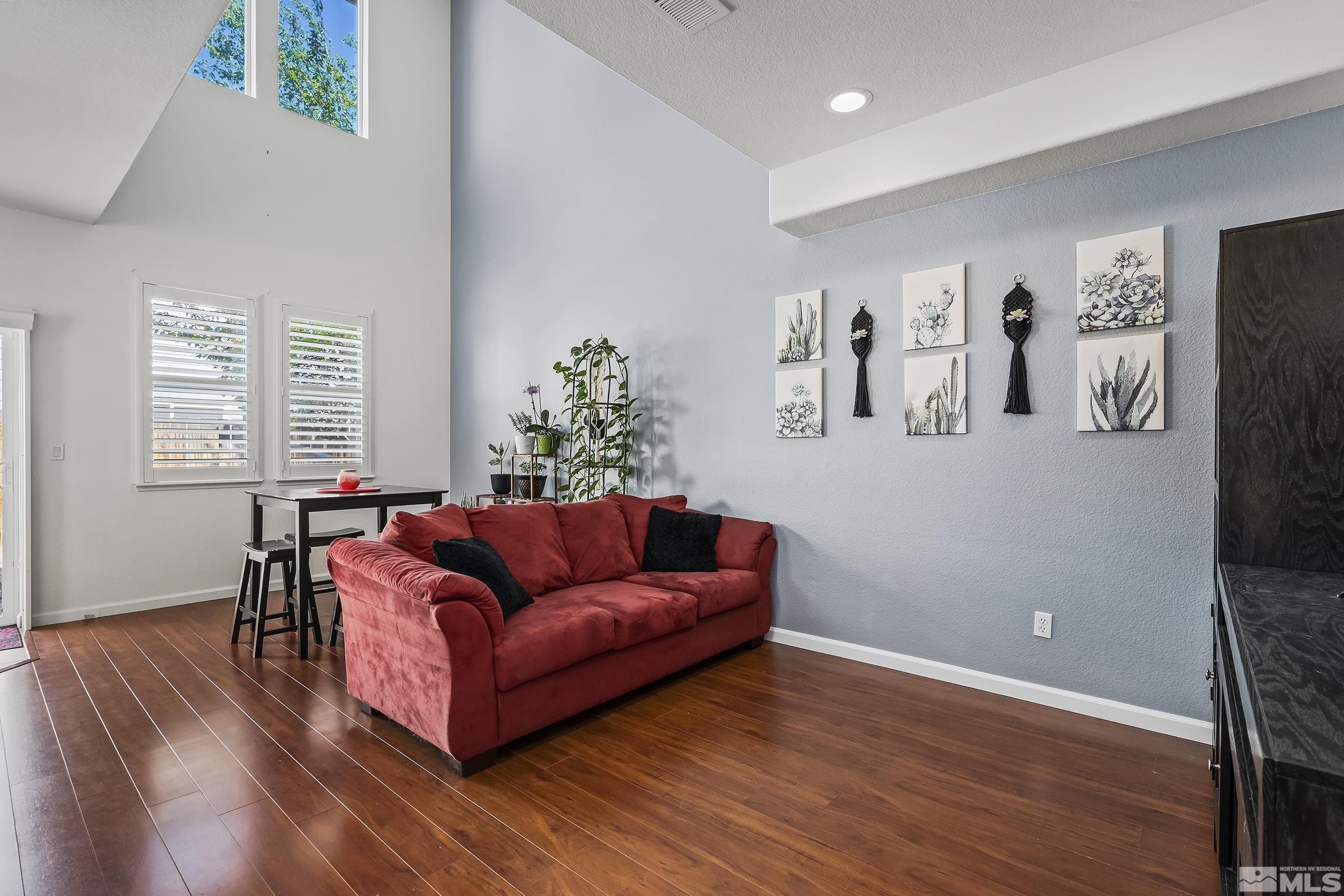 2115 Stanton Lane Reno, NV 89502 - Photo 3 of 18 a living room with furniture and a flat screen tv
