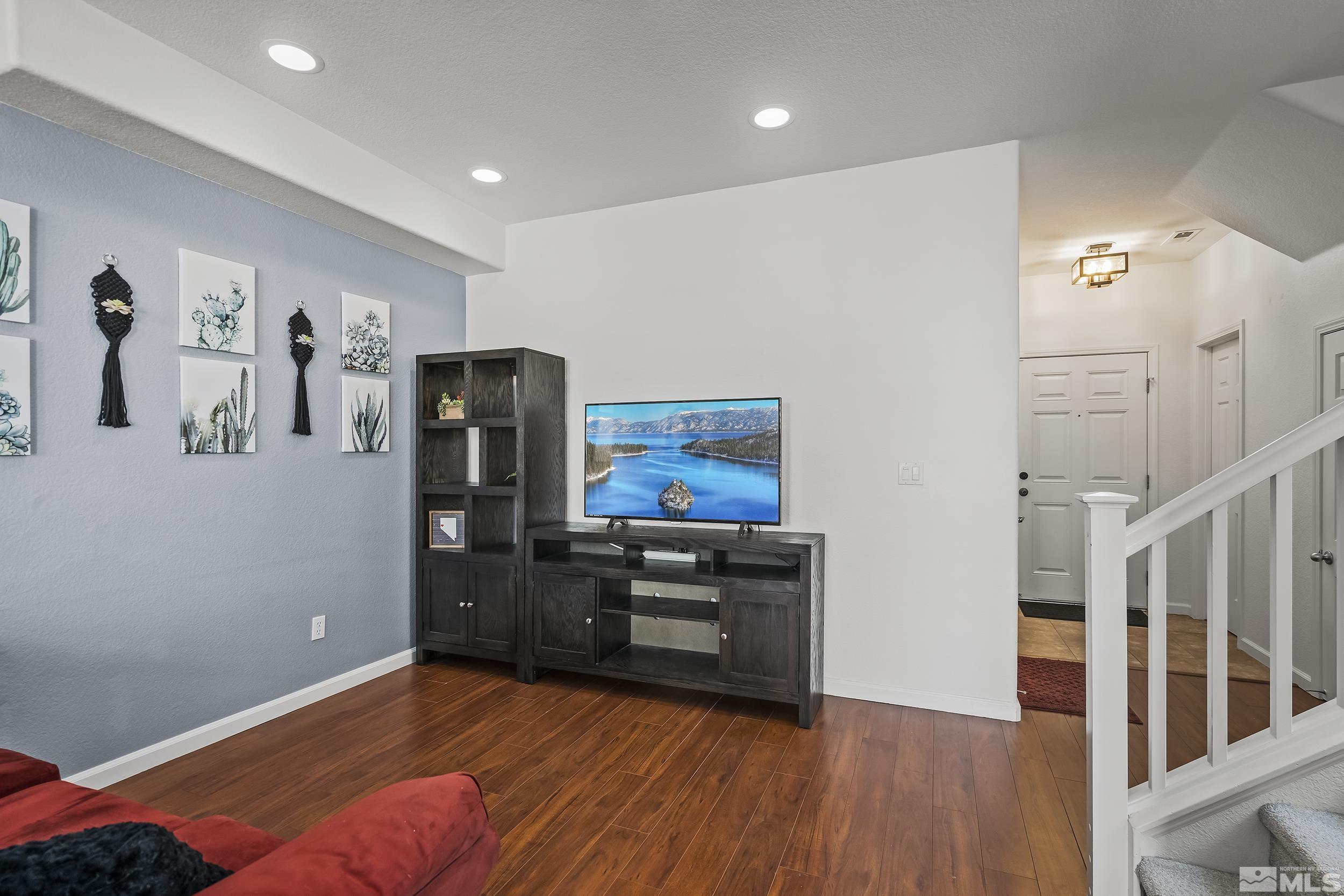 2115 Stanton Lane Reno, NV 89502 - Photo 4 of 18 a view of a kitchen with furniture and wooden floor