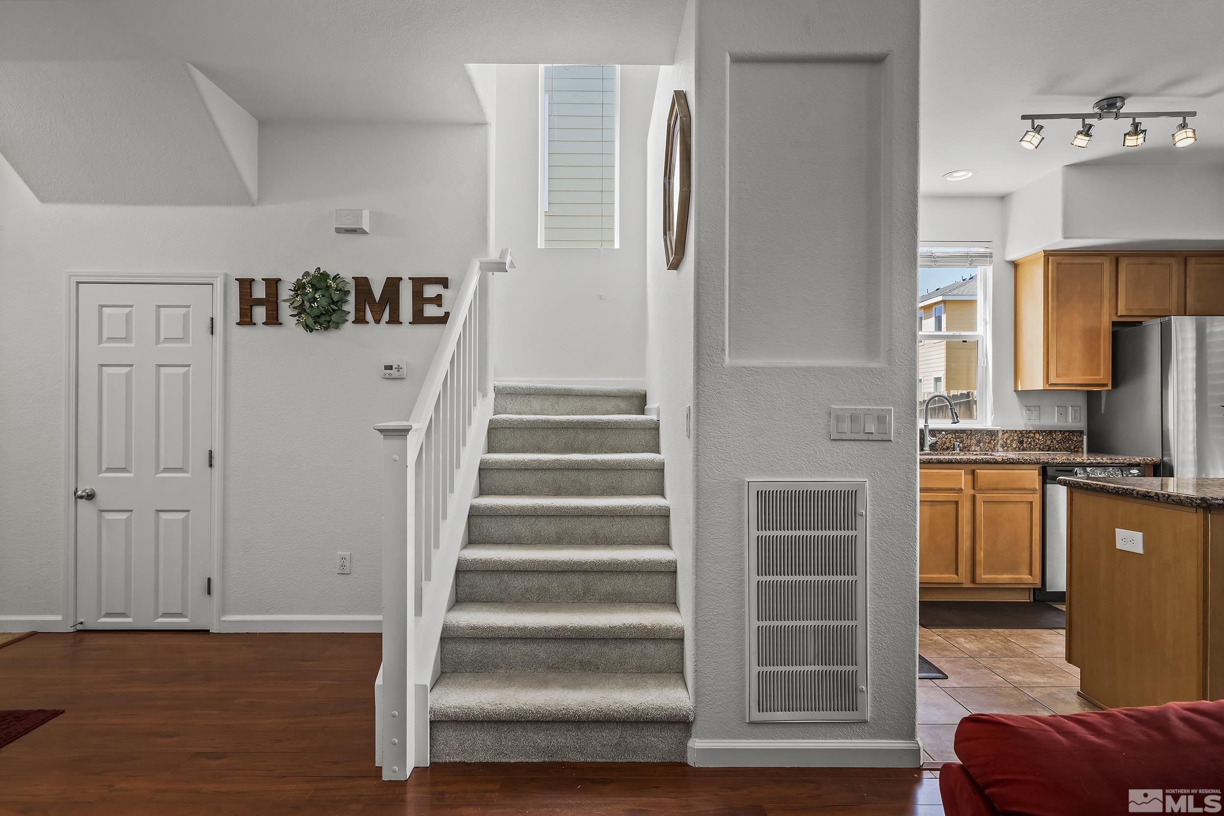 2115 Stanton Lane Reno, NV 89502 - Photo 5 of 18 a view of kitchen with wooden floor and electronic appliances