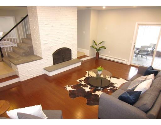 108 Pine Ridge Road Medford, MA 02155 - Photo 14 of 25 a living room with furniture and a fireplace