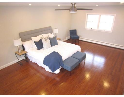 108 Pine Ridge Road Medford, MA 02155 - Photo 17 of 25 a bed room with a bed