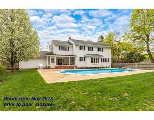 108 Pine Ridge Road Medford, MA 02155 - Photo 5 of 25 a front view of a house with a garden