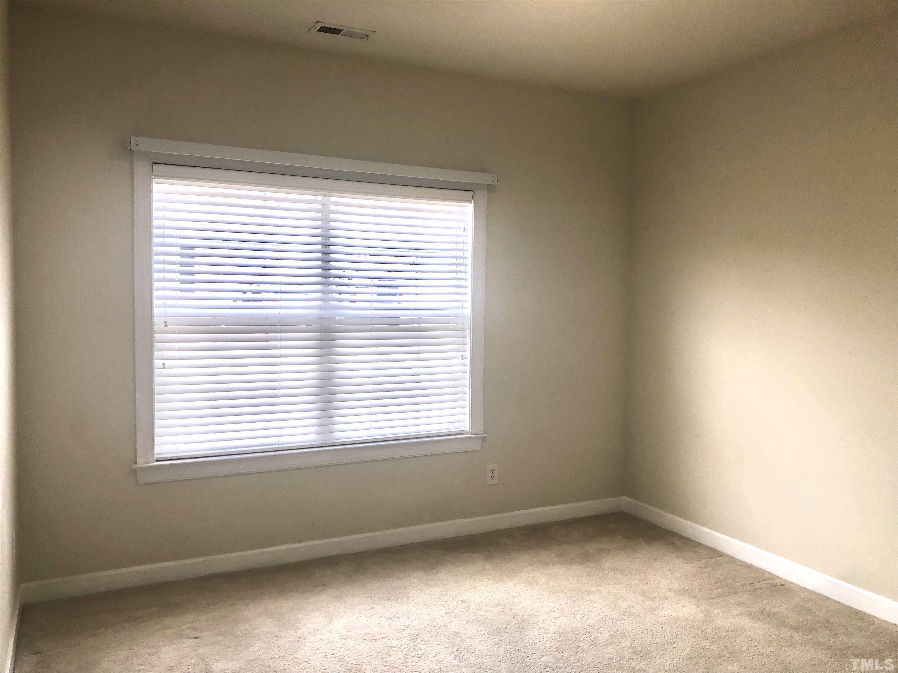 4720 Fox Fern Lane Raleigh, NC 27604 - Photo 17 of 20 an empty room with a window