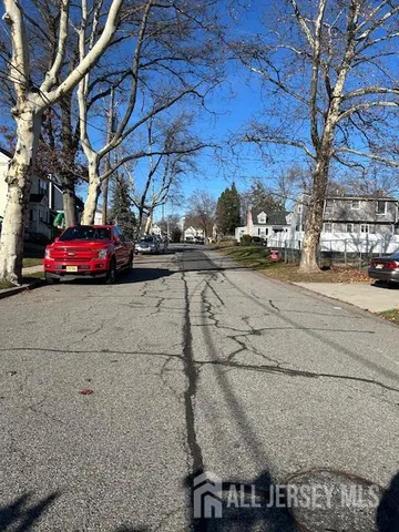 a view of a street with cars