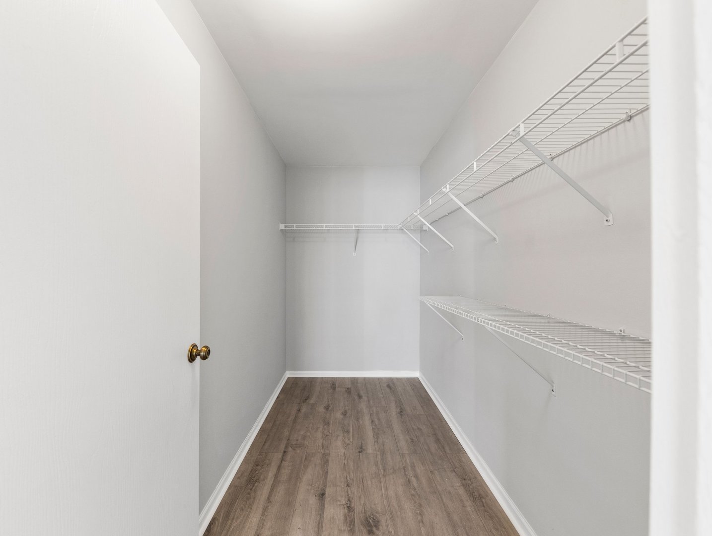 2503 Sheehan Drive, Unit 101 Naperville, IL 60564 - Photo 13 of 19 a view of a hallway with wooden floor