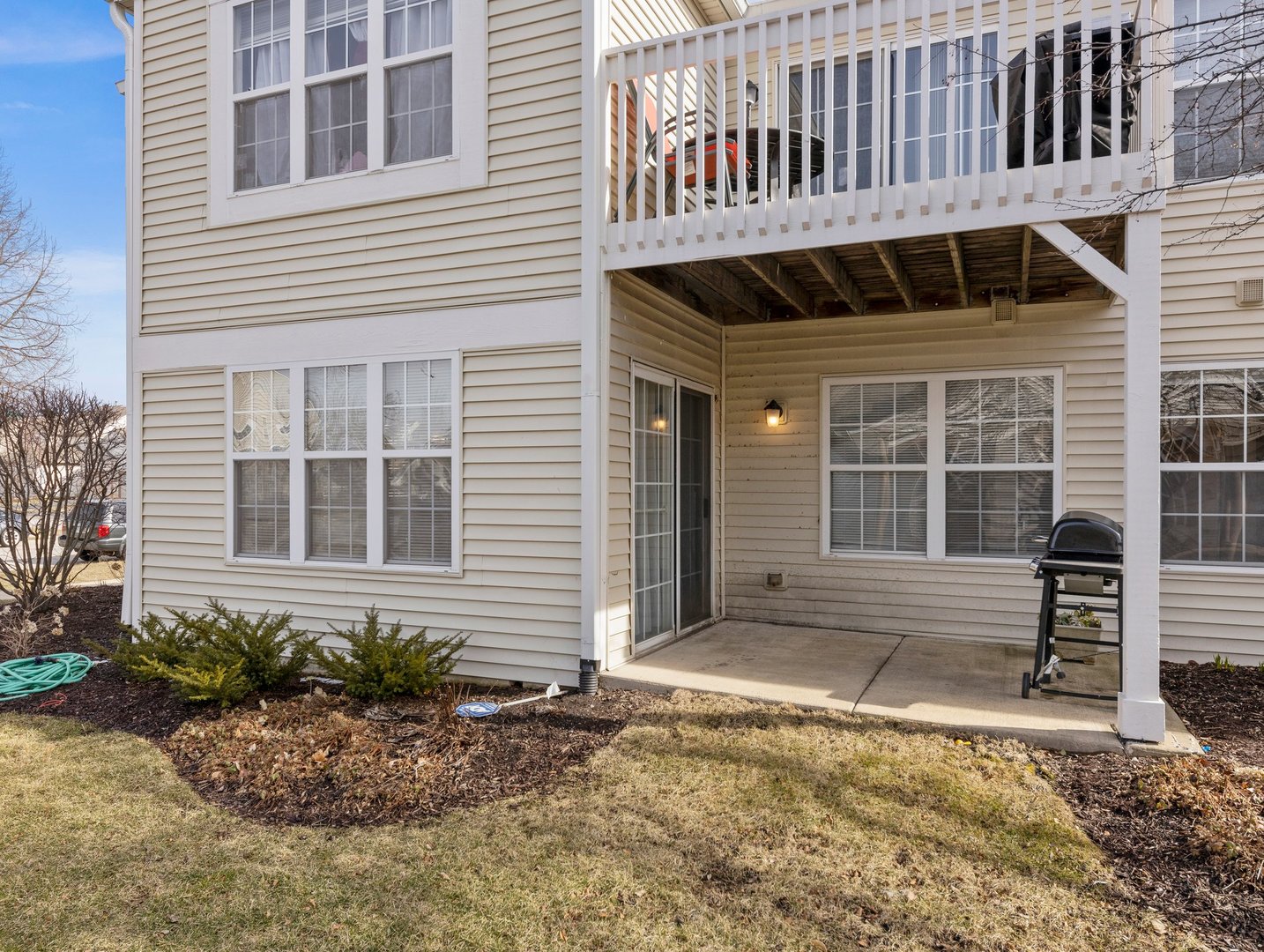 2503 Sheehan Drive, Unit 101 Naperville, IL 60564 - Photo 18 of 19 a front view of a house with a yard