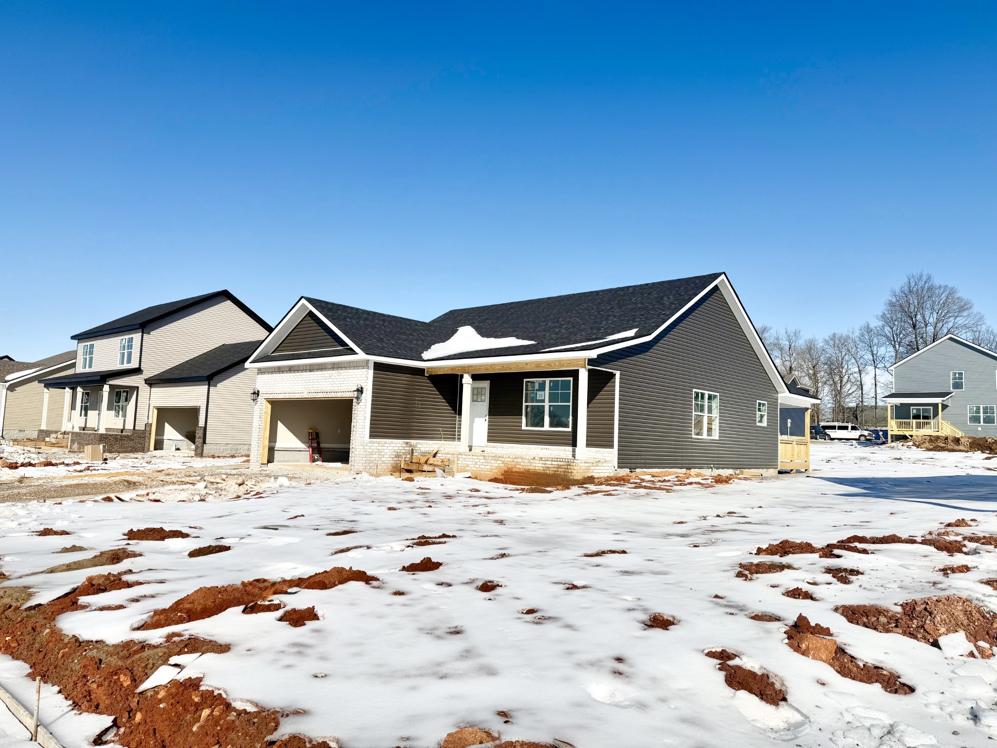 32 Echo Ridge Oak Grove, KY 42262 - Photo 2 of 42 a front view of a house with a yard