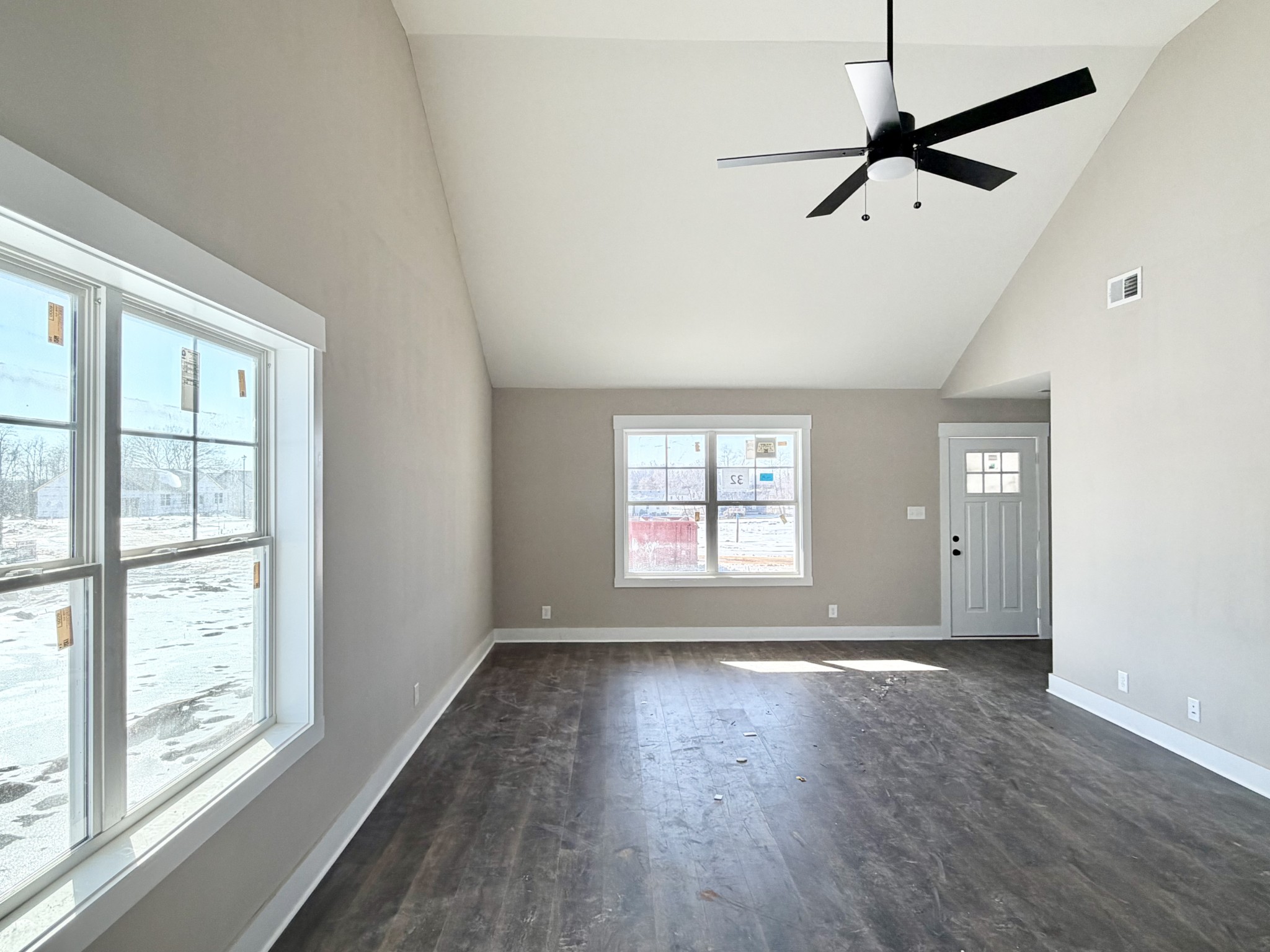 32 Echo Ridge Oak Grove, KY 42262 - Photo 30 of 42 an empty room with wooden floor fan and windows