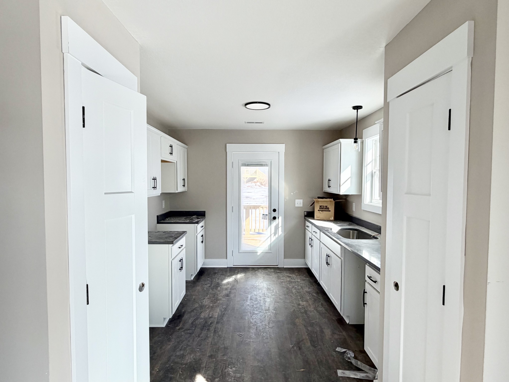 32 Echo Ridge Oak Grove, KY 42262 - Photo 31 of 42 a kitchen with white cabinets and stainless steel appliances