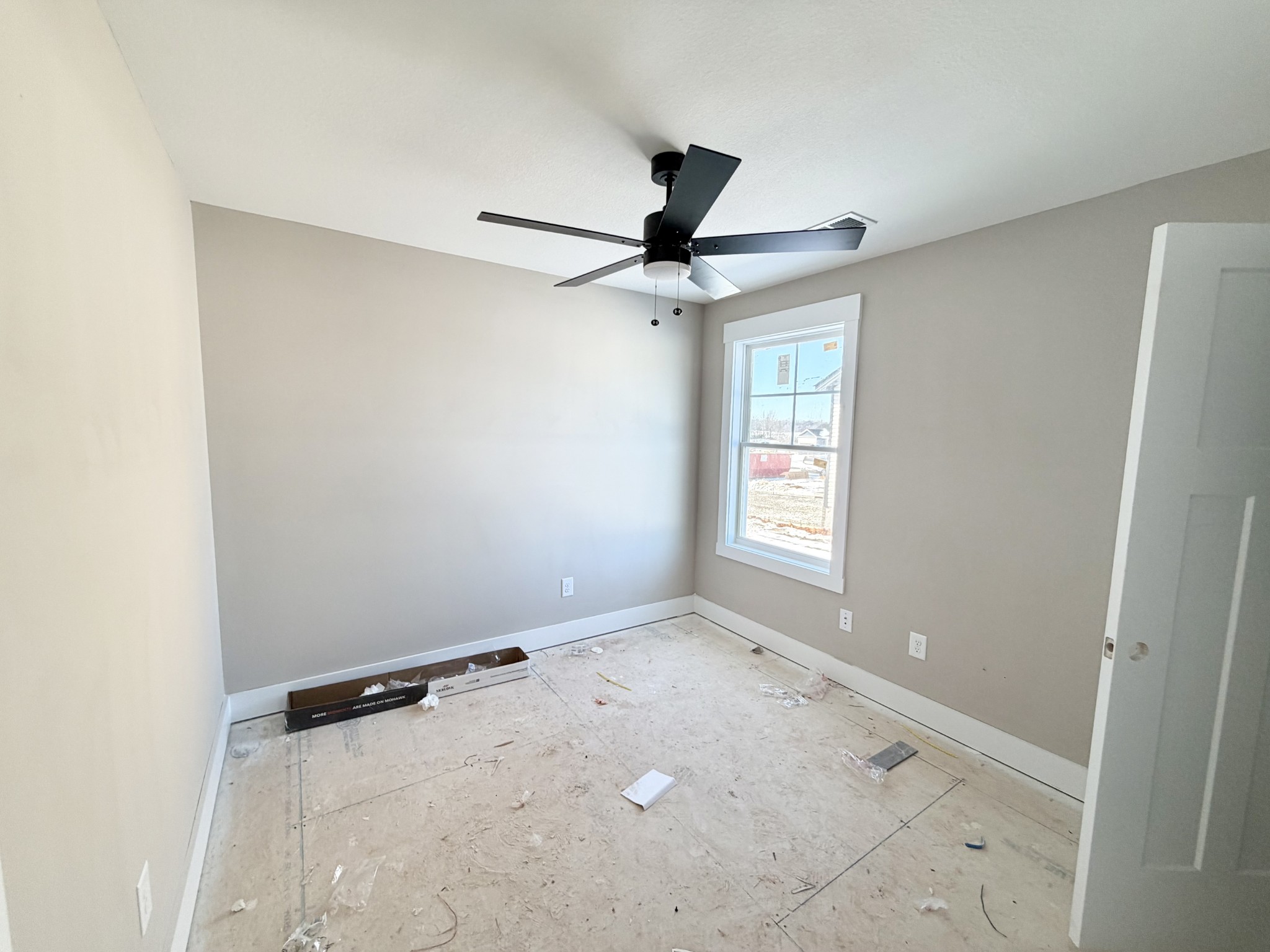 32 Echo Ridge Oak Grove, KY 42262 - Photo 41 of 42 an empty room with a window and a fan