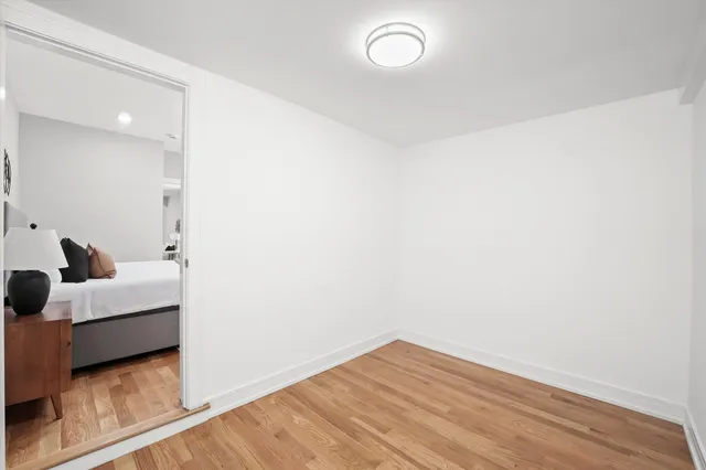 a view of bedroom with hardwood floor