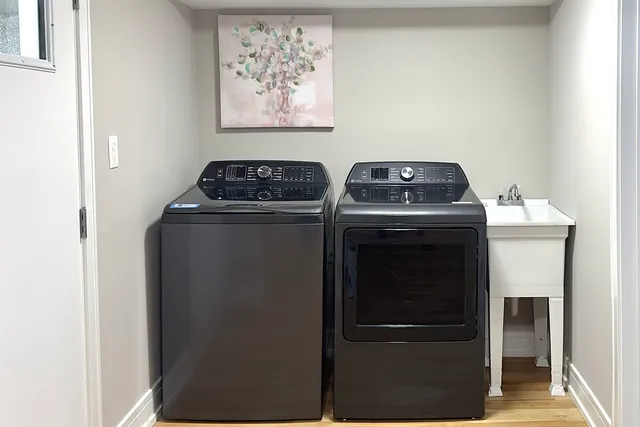 a stove top oven sitting inside of a kitchen