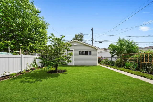 a house view with a garden space