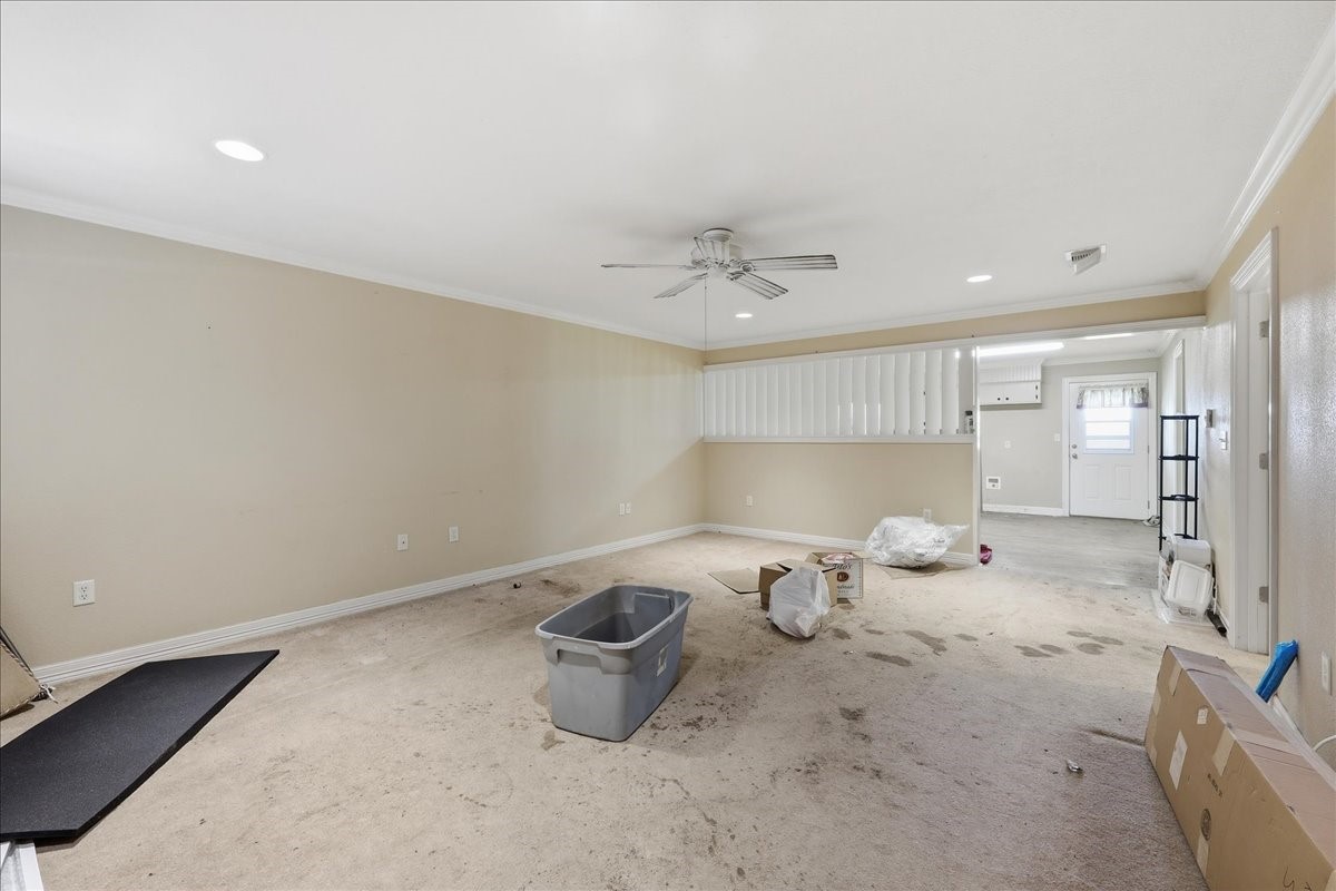 150 Gary Street Bridge City, TX 77611 - Photo 3 of 12 Open-concept common area showing living and dining space.
