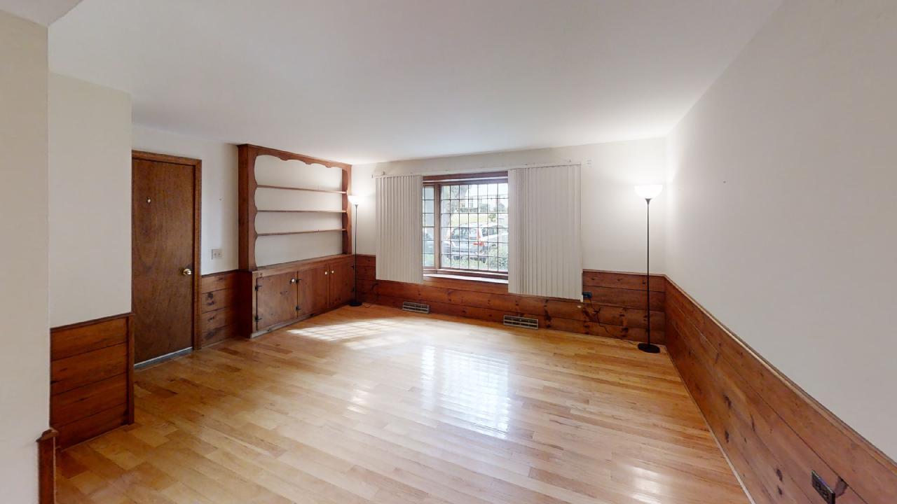 6 Old Hills Road Dennis, MA 02638 - Photo 16 of 45 a view of empty room with wooden floor and fan