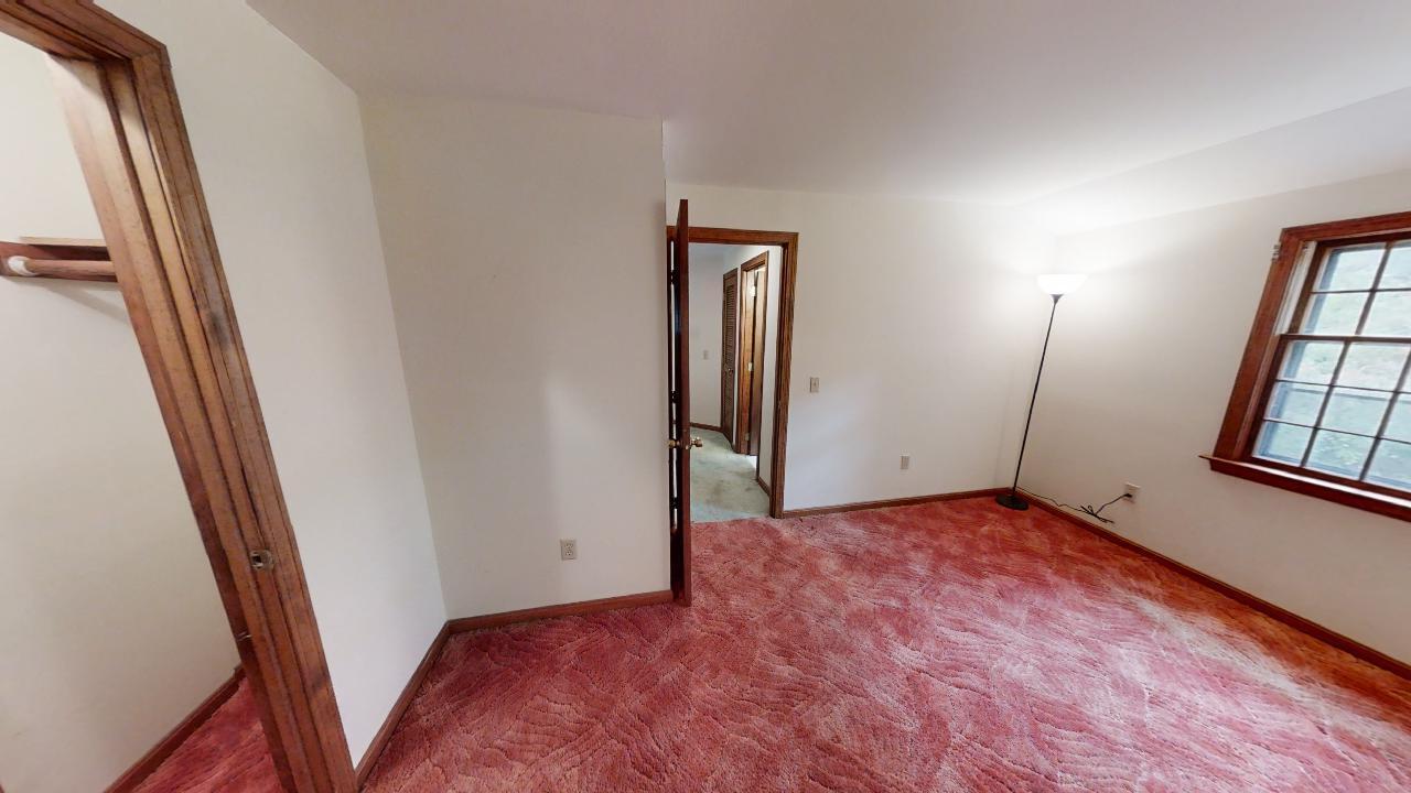 6 Old Hills Road Dennis, MA 02638 - Photo 25 of 45 wooden floor in an empty room with a mirror