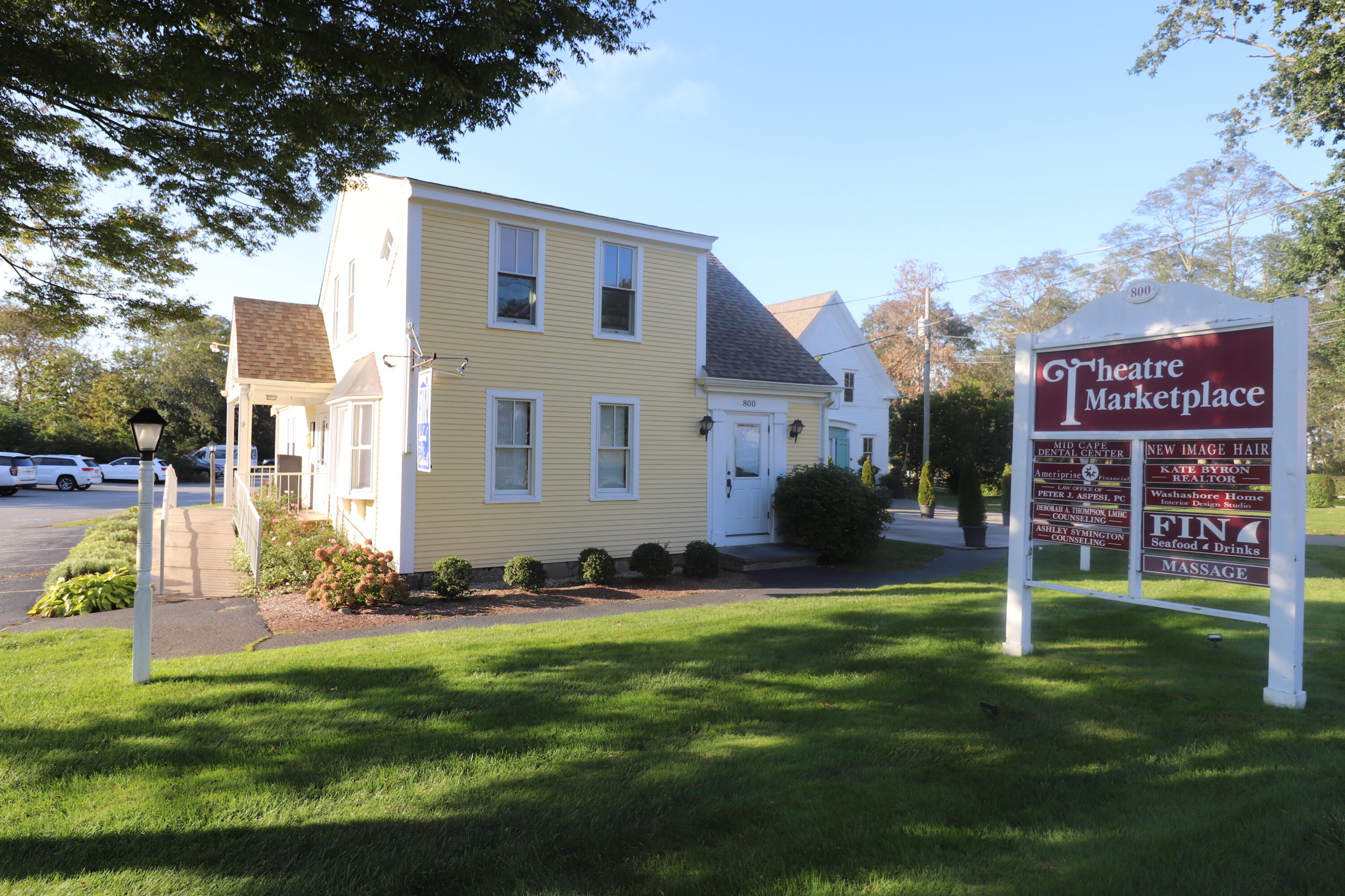 6 Old Hills Road Dennis, MA 02638 - Photo 37 of 45 a view of an house with backyard space and sitting area