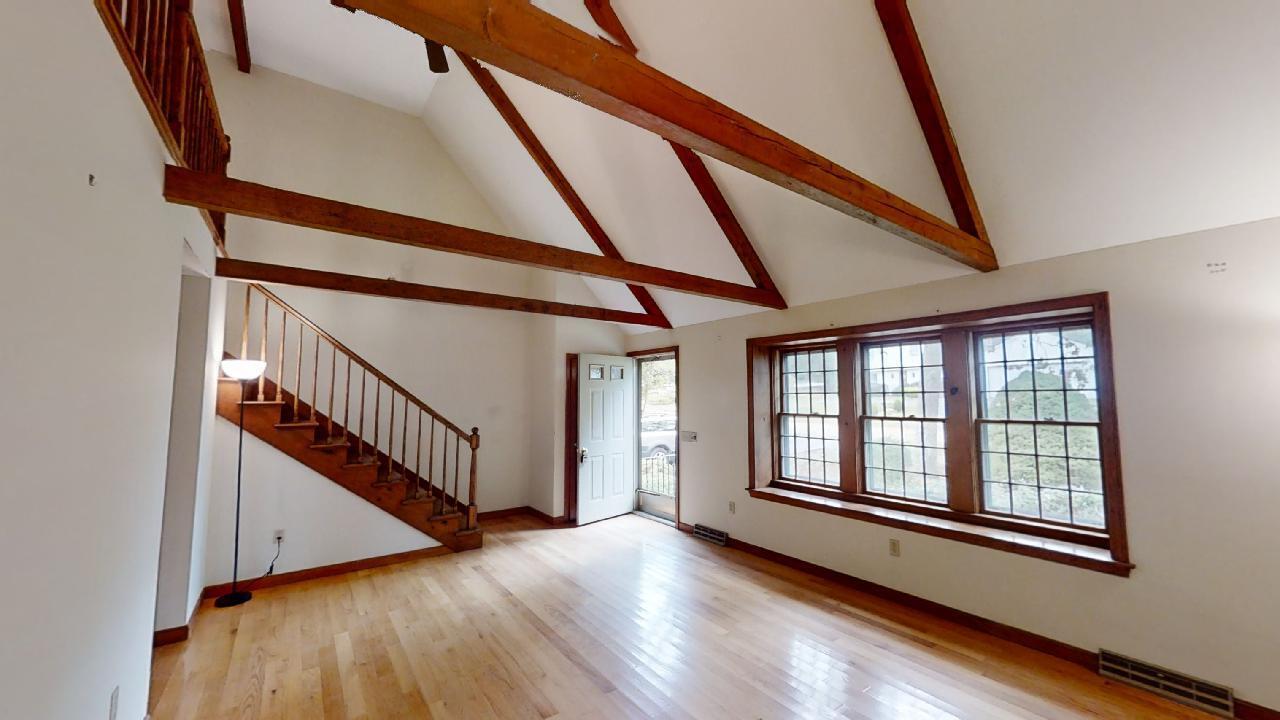 6 Old Hills Road Dennis, MA 02638 - Photo 6 of 45 a view of an entryway with wooden floor
