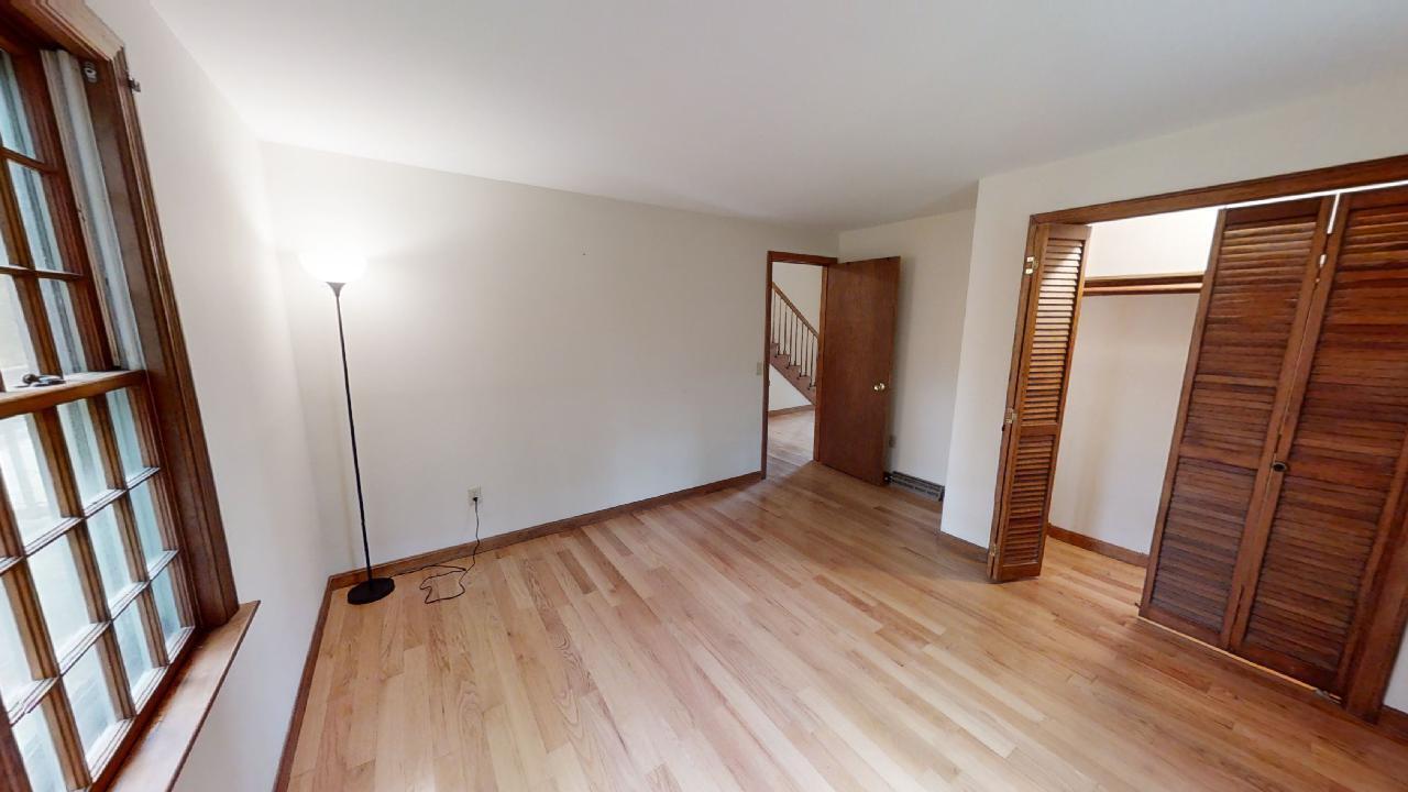 6 Old Hills Road Dennis, MA 02638 - Photo 7 of 45 an empty room with wooden floor and entrance