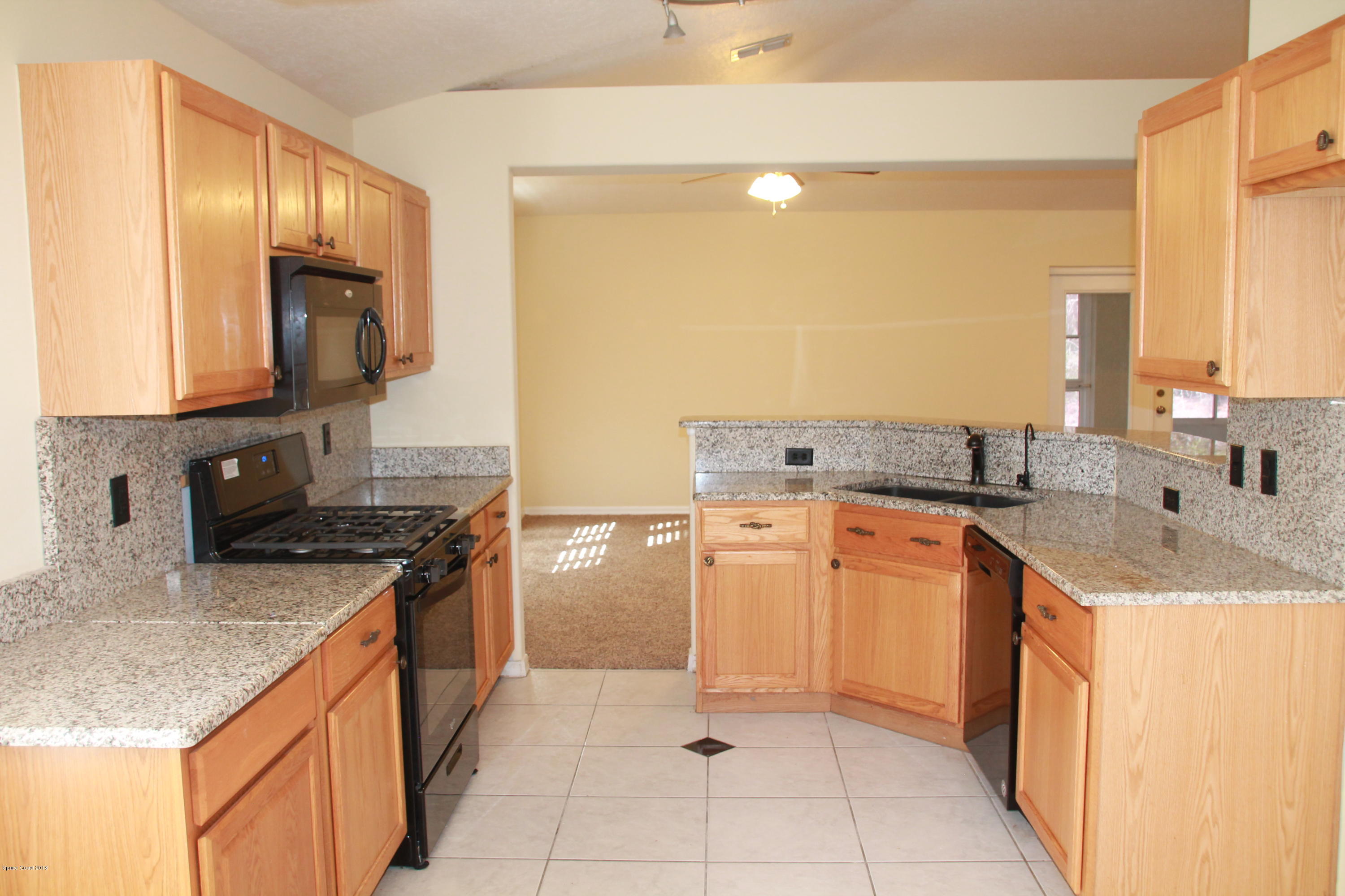 2143 Spring Creek Circle Palm Bay, FL 32905 - Photo 2 of 19 KItchen View 1
