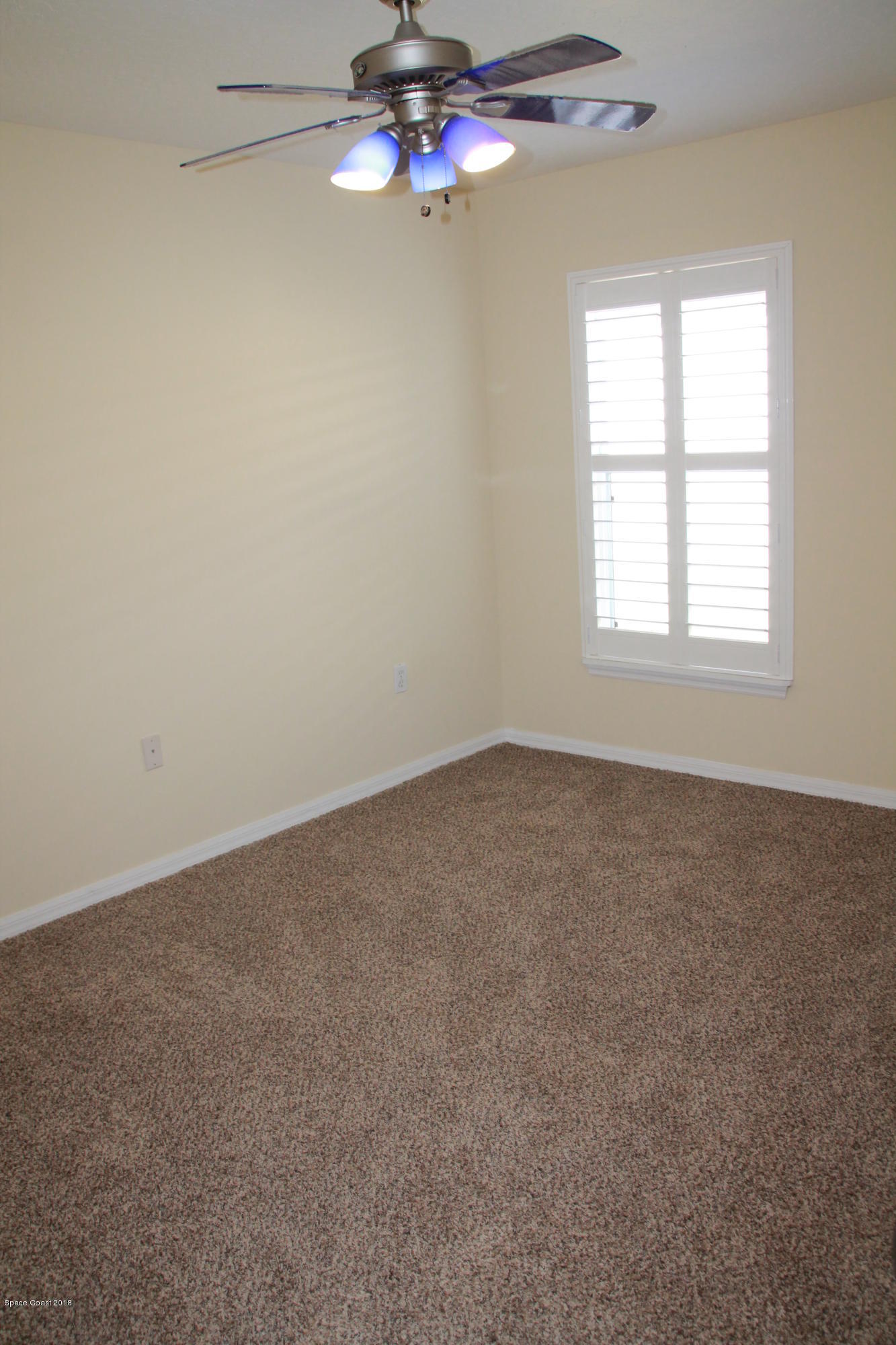 2143 Spring Creek Circle Palm Bay, FL 32905 - Photo 14 of 19 Guest bedroom 2