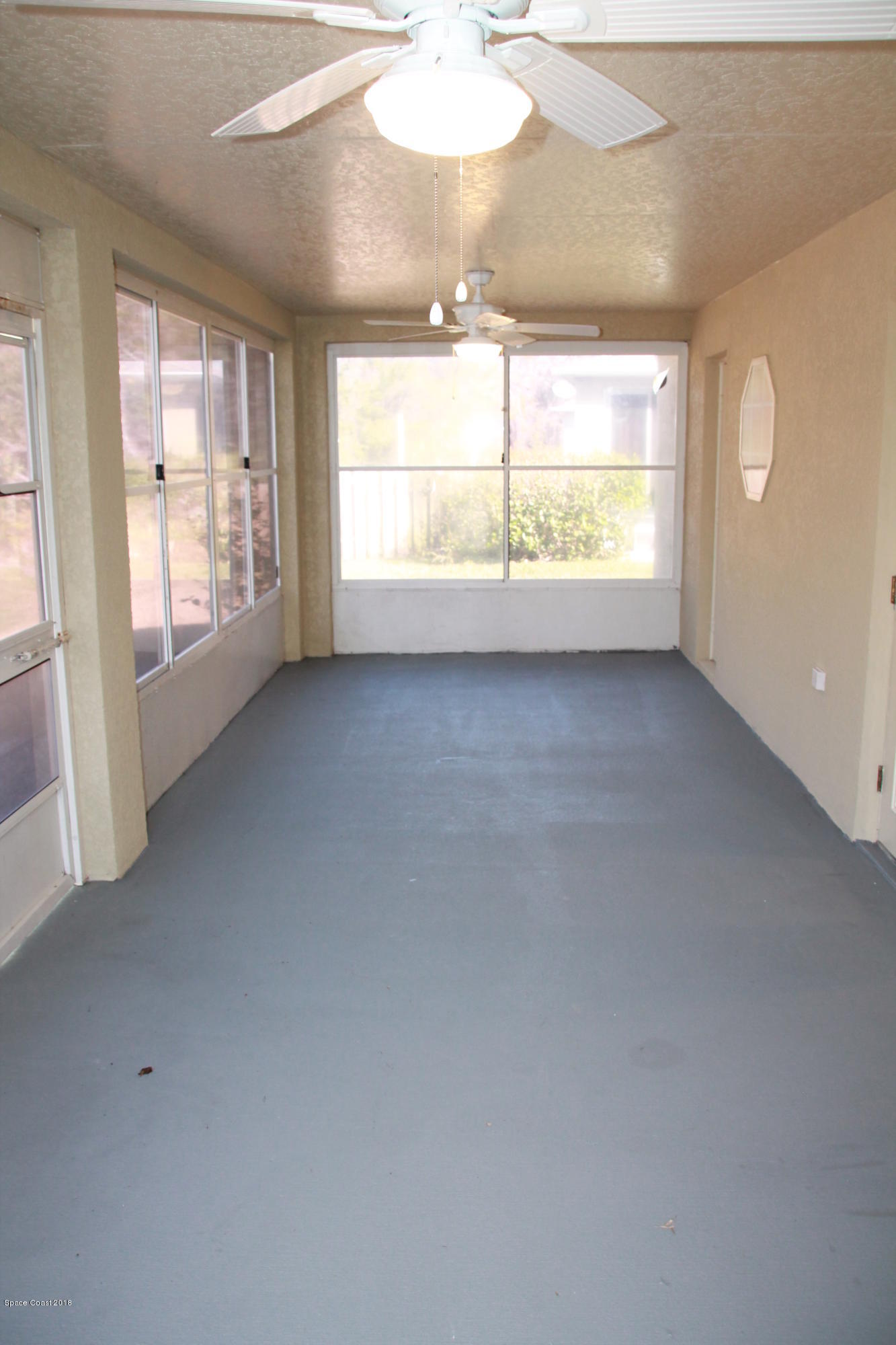 2143 Spring Creek Circle Palm Bay, FL 32905 - Photo 17 of 19 Sunroom